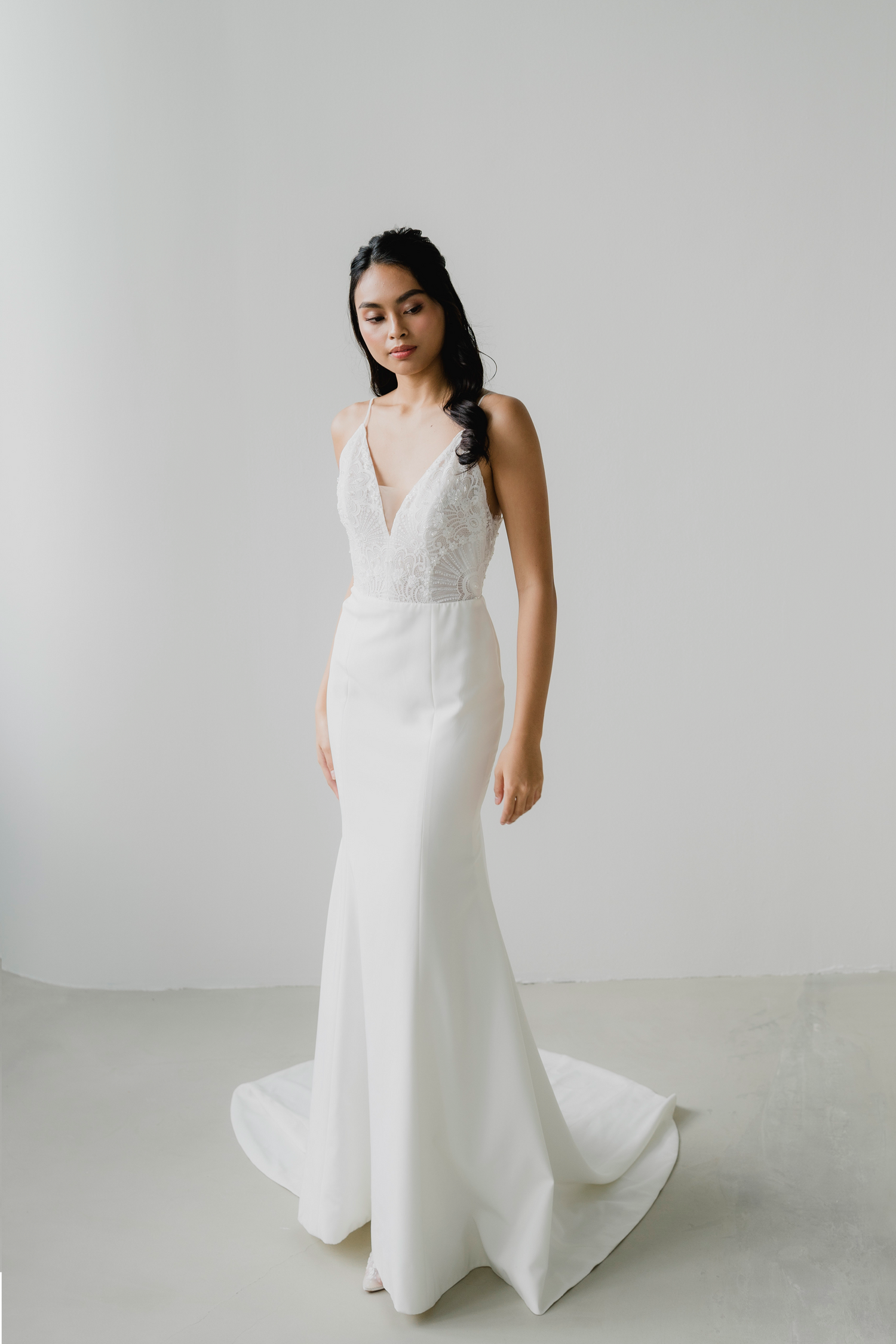 Adele bridal gown featuring a crepe mermaid silhouette