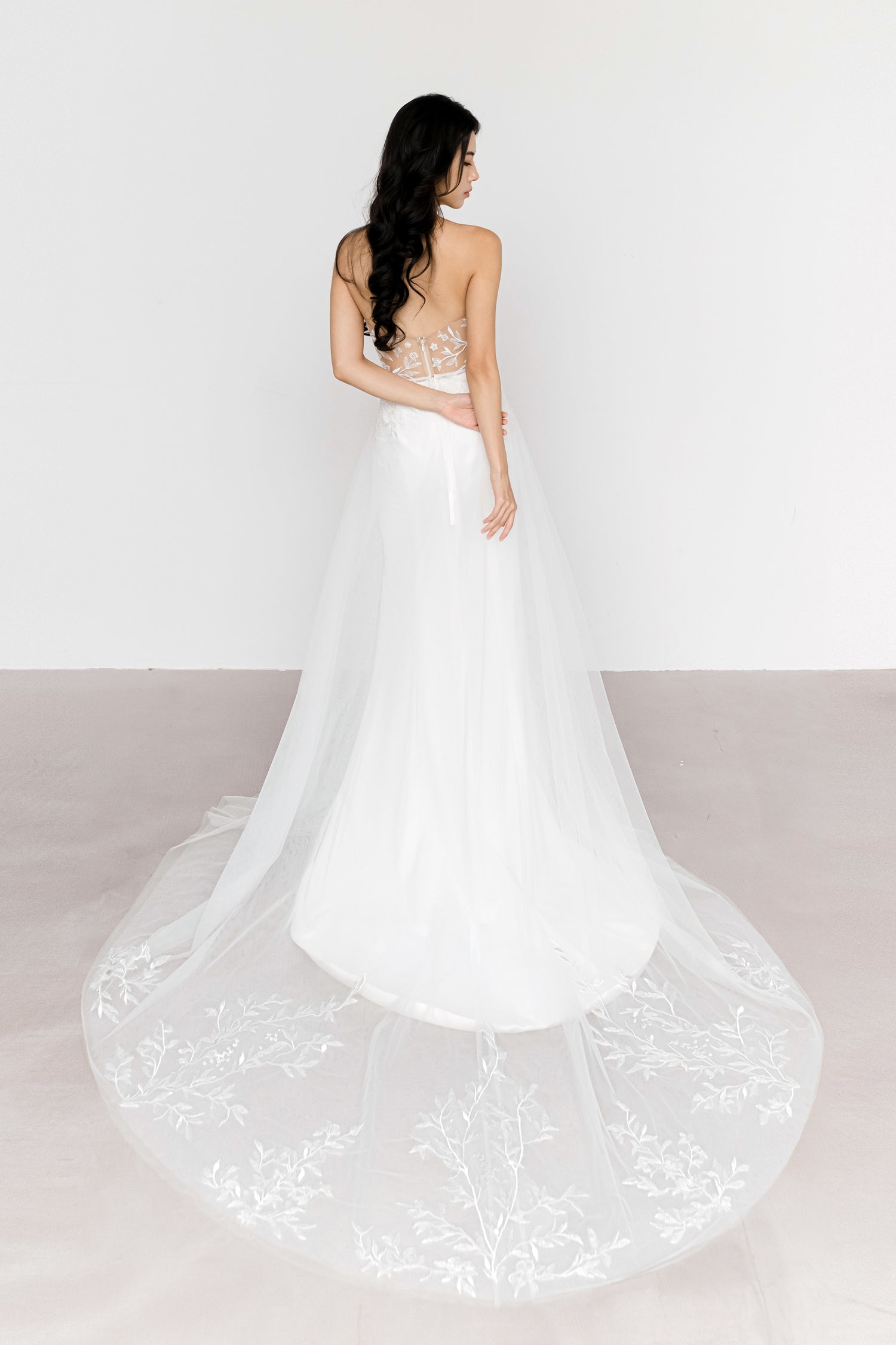 Aria bridal gown back view with the detachable tulle overskirt
