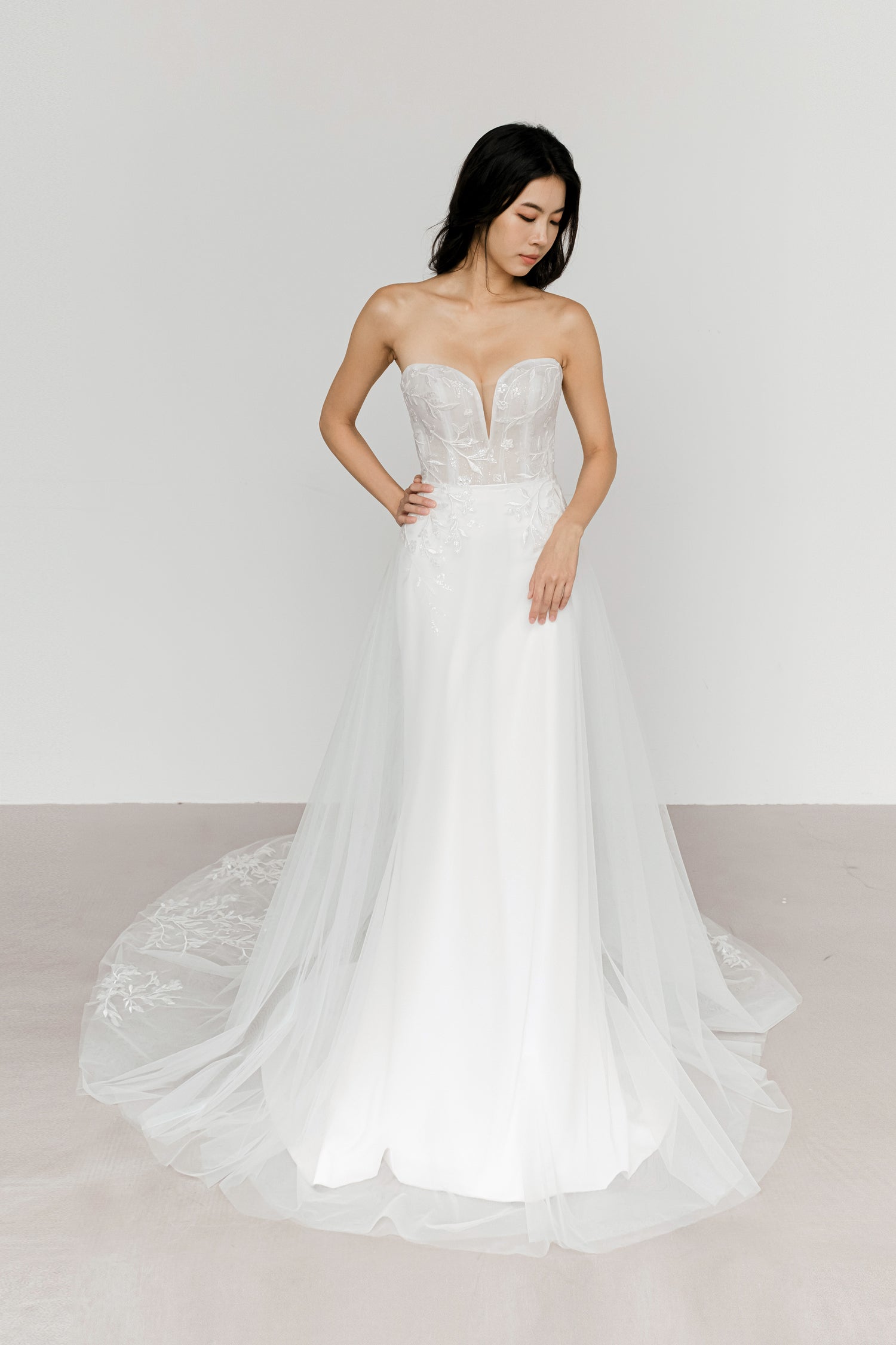 Aria bridal gown featuring the detachable tulle overskirt and botanical lace