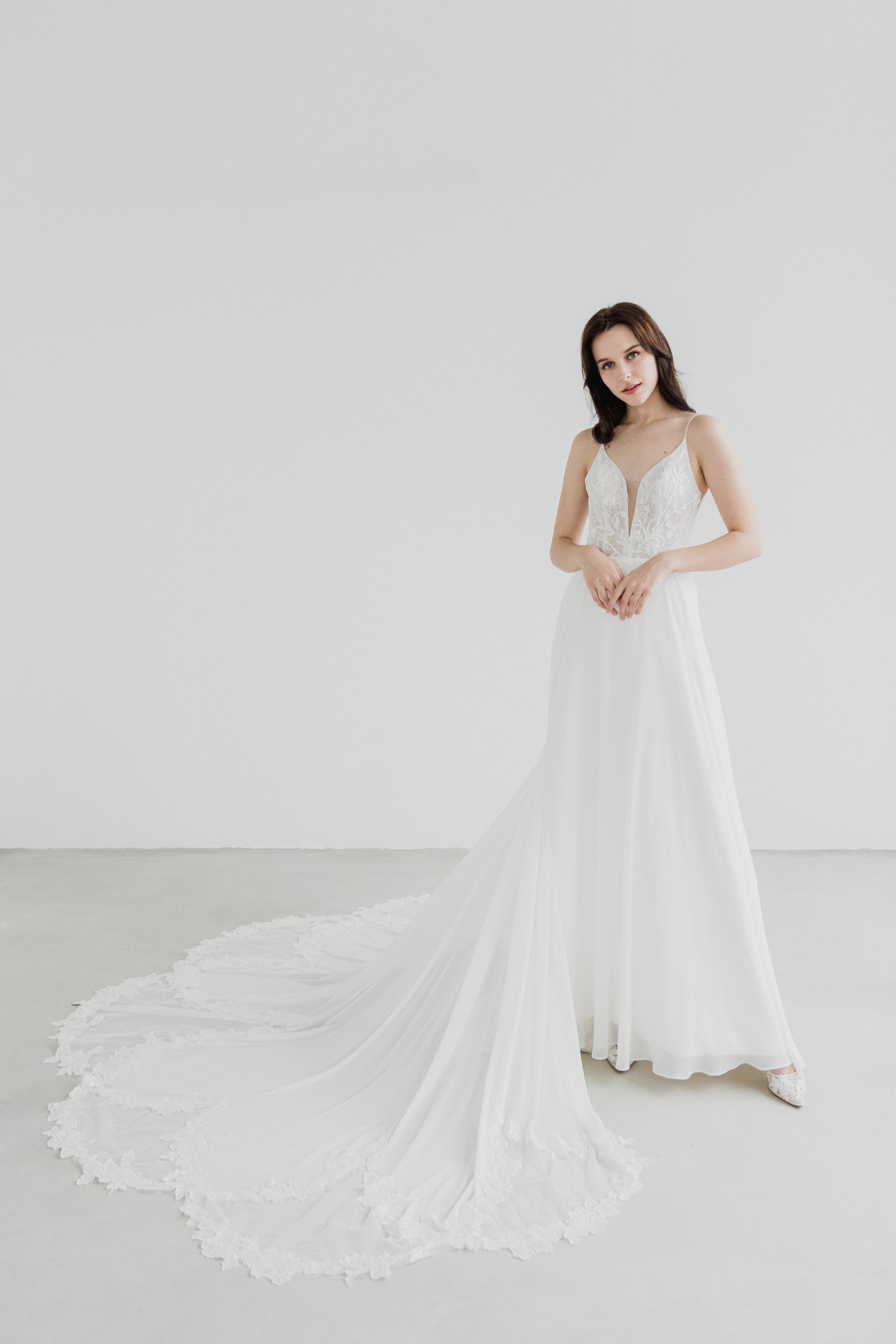 Aveline wedding dress front view with spaghetti straps and A-line silhouette