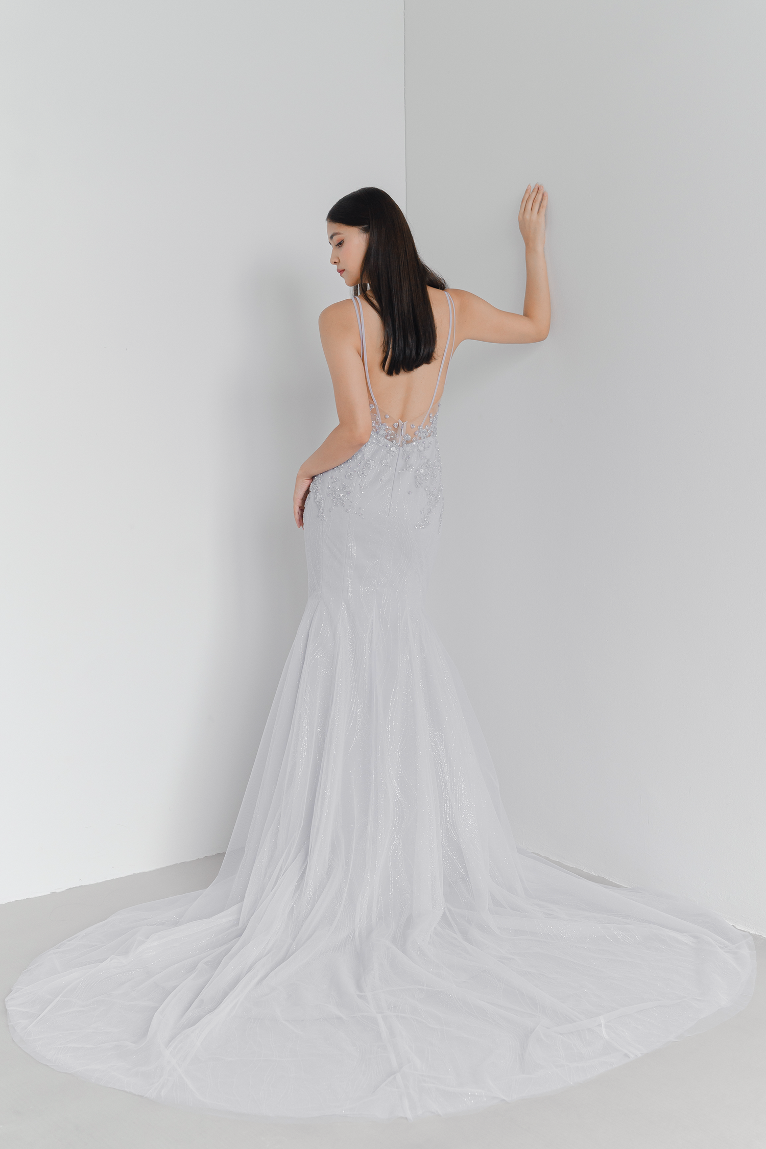 Bailey bridal evening gown train showcasing shimmering embellishments and an elegant silhouette