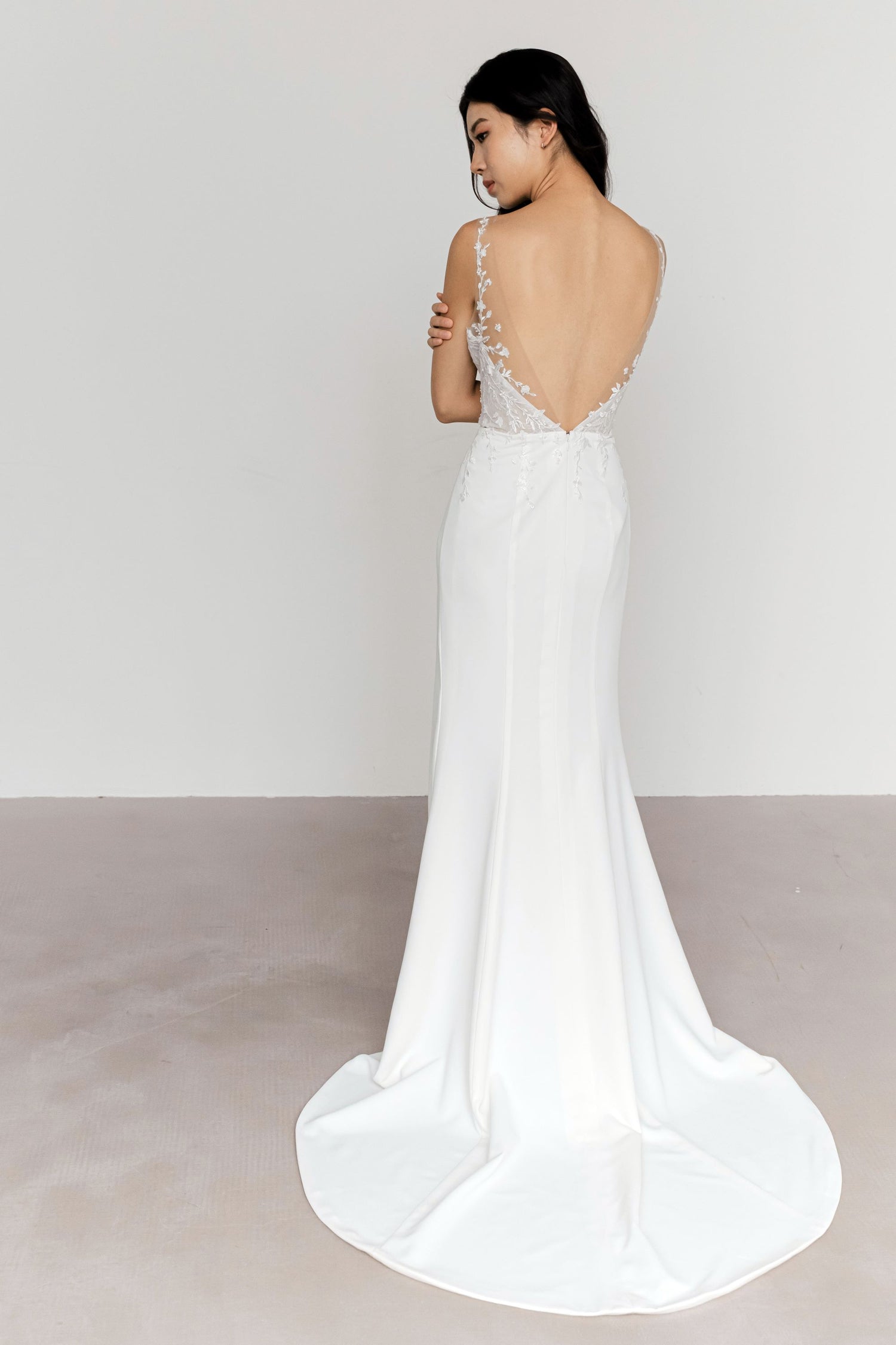 Beverly wedding gown showcasing the elegant crepe train