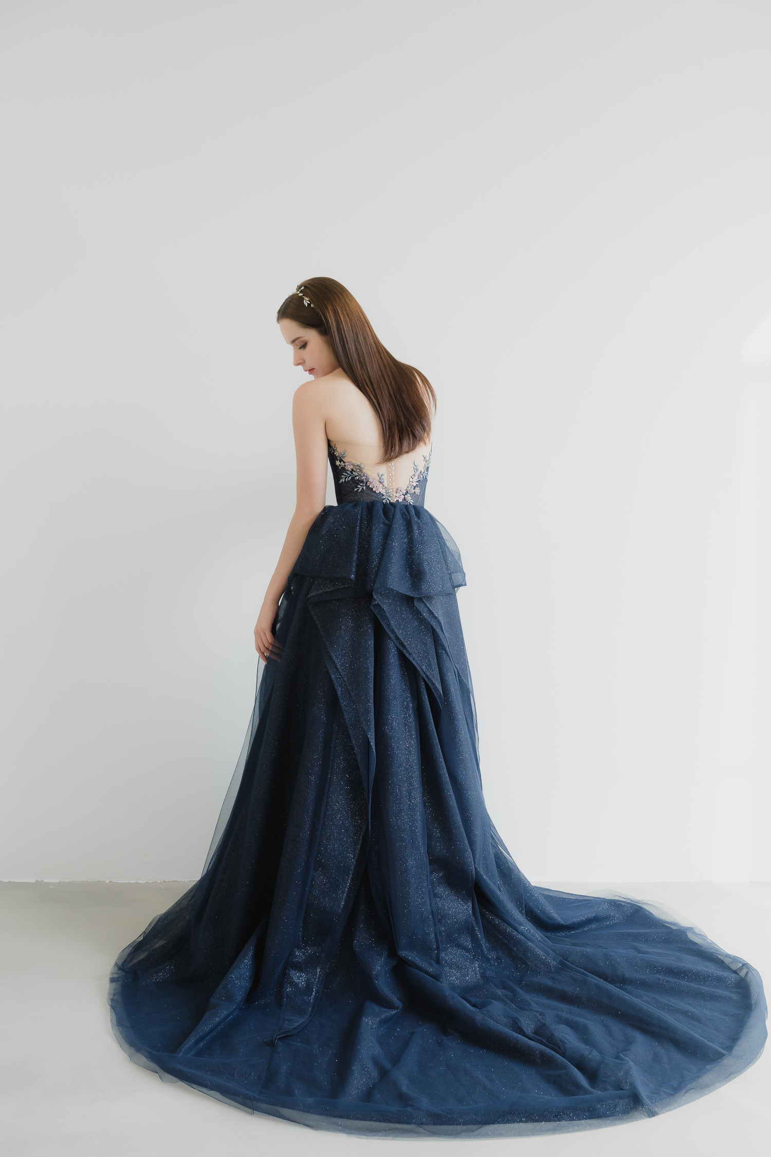 Brenda evening dress back view with an elegant layered design