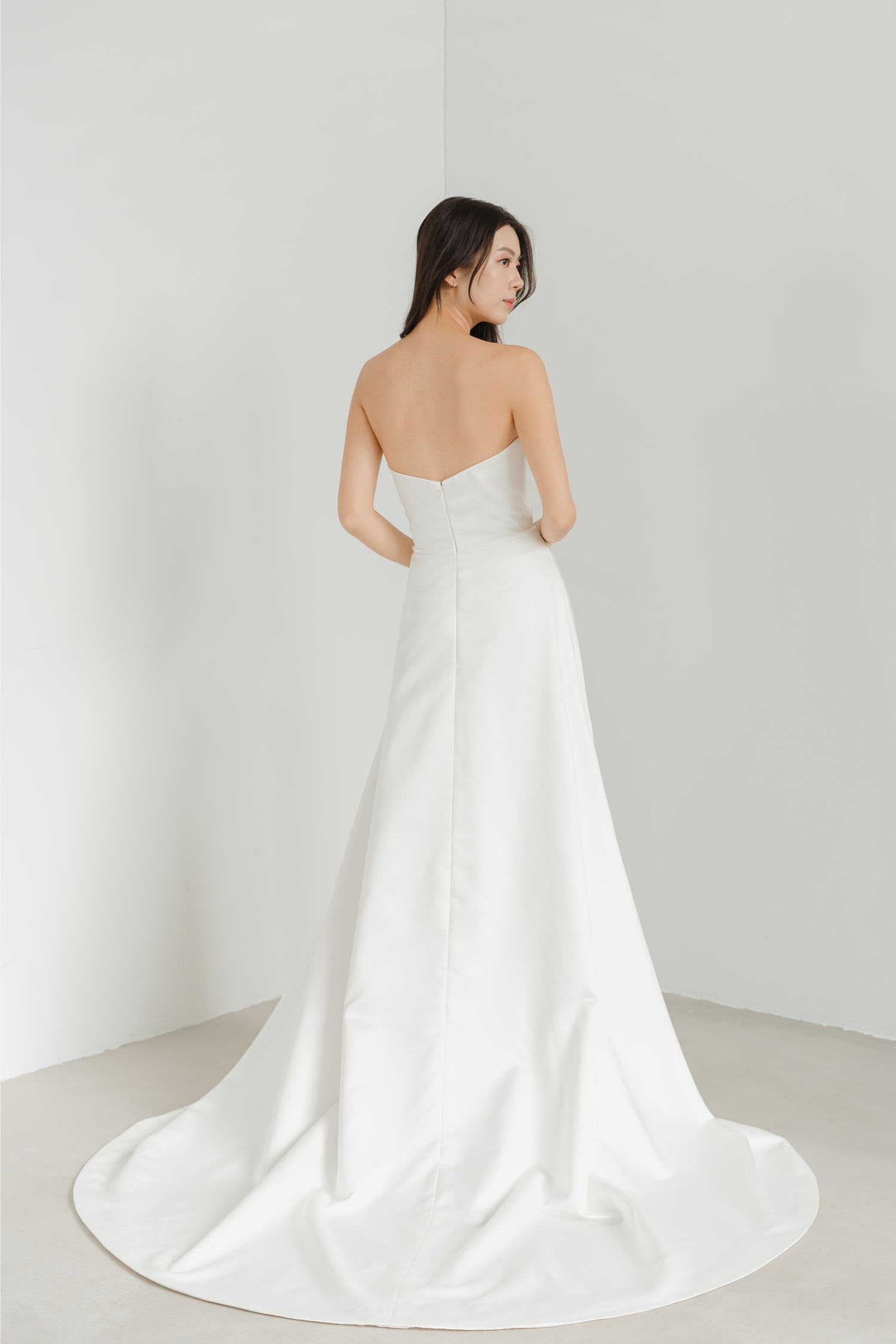 Camila bridal gown back view with a clean satin design
