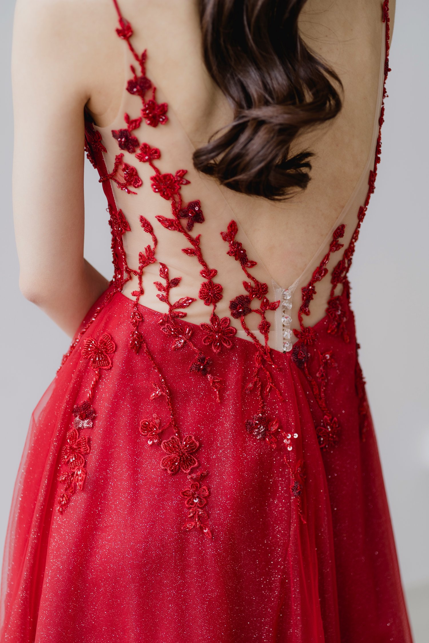 Close-up of Charlotte bridal evening gown featuring the low illusion back