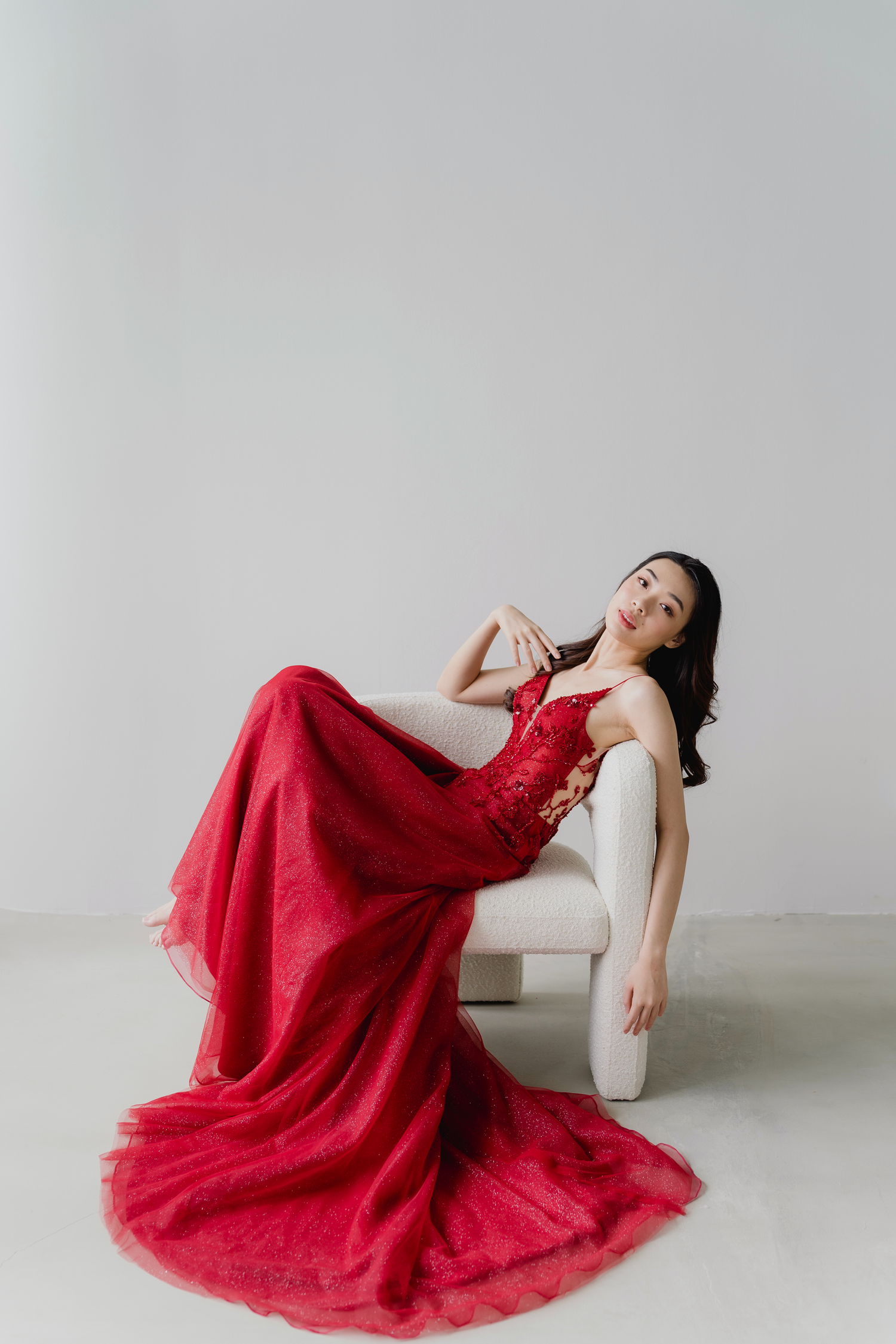 Charlotte bridal evening gown front view with glitter tulle and red beaded lace