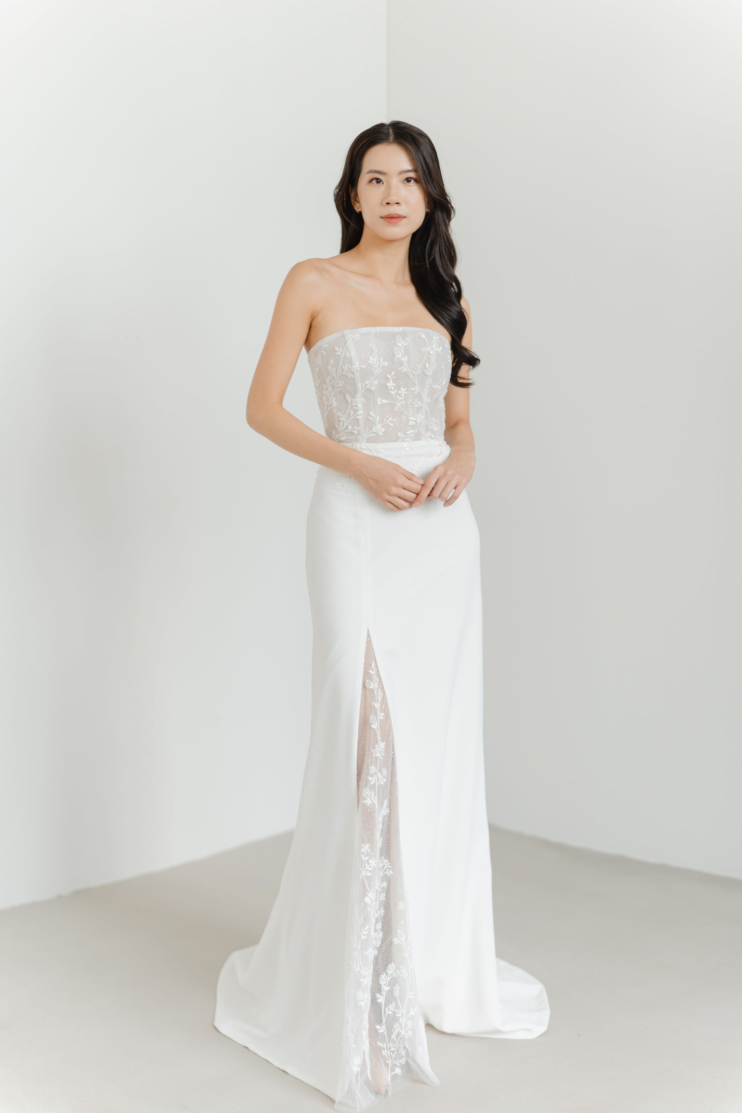Cleo wedding dress front view with a straight neckline and relaxed mermaid silhouette