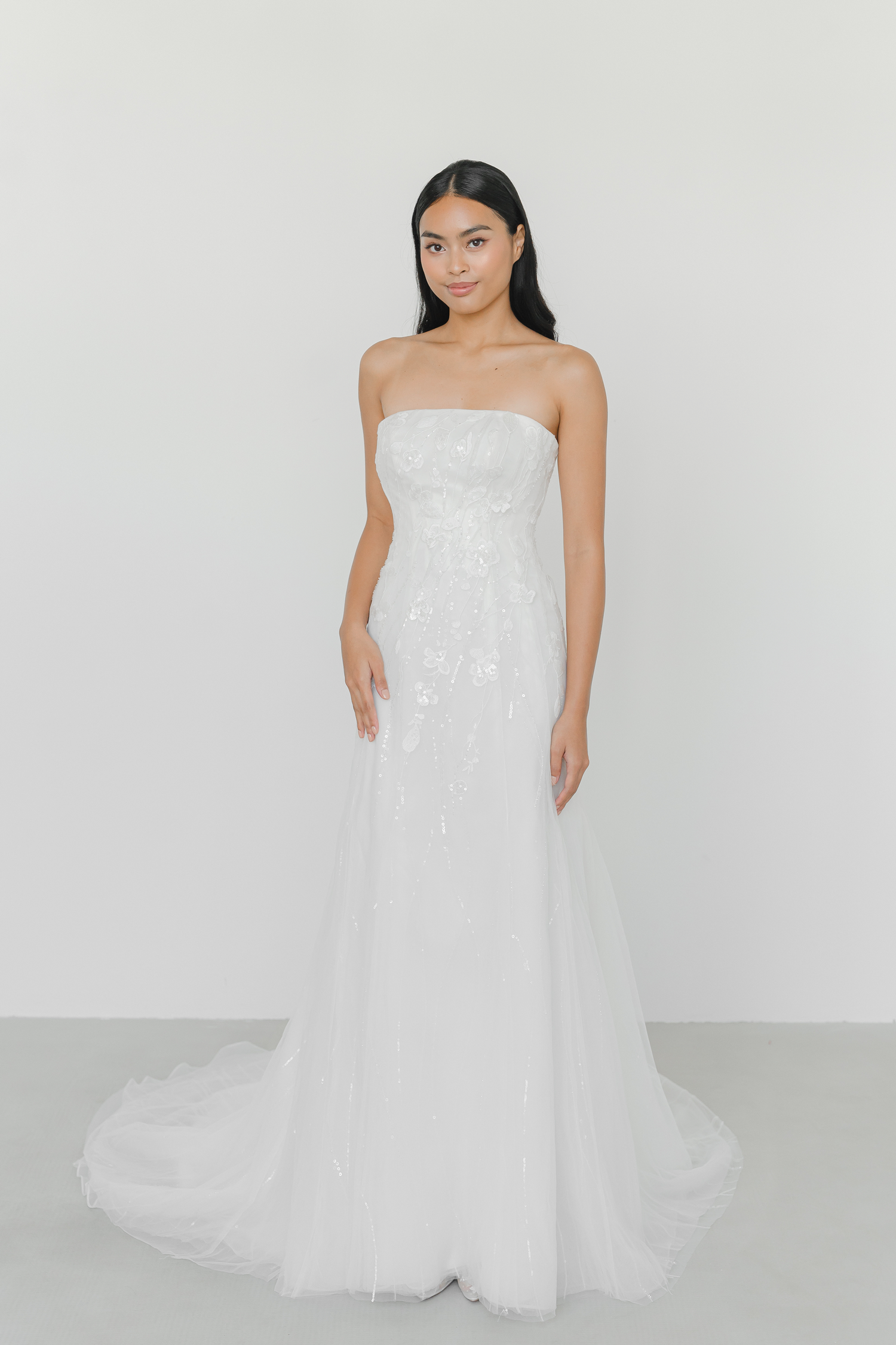 Evan bridal gown featuring subtle sparkle and a seamless waist design