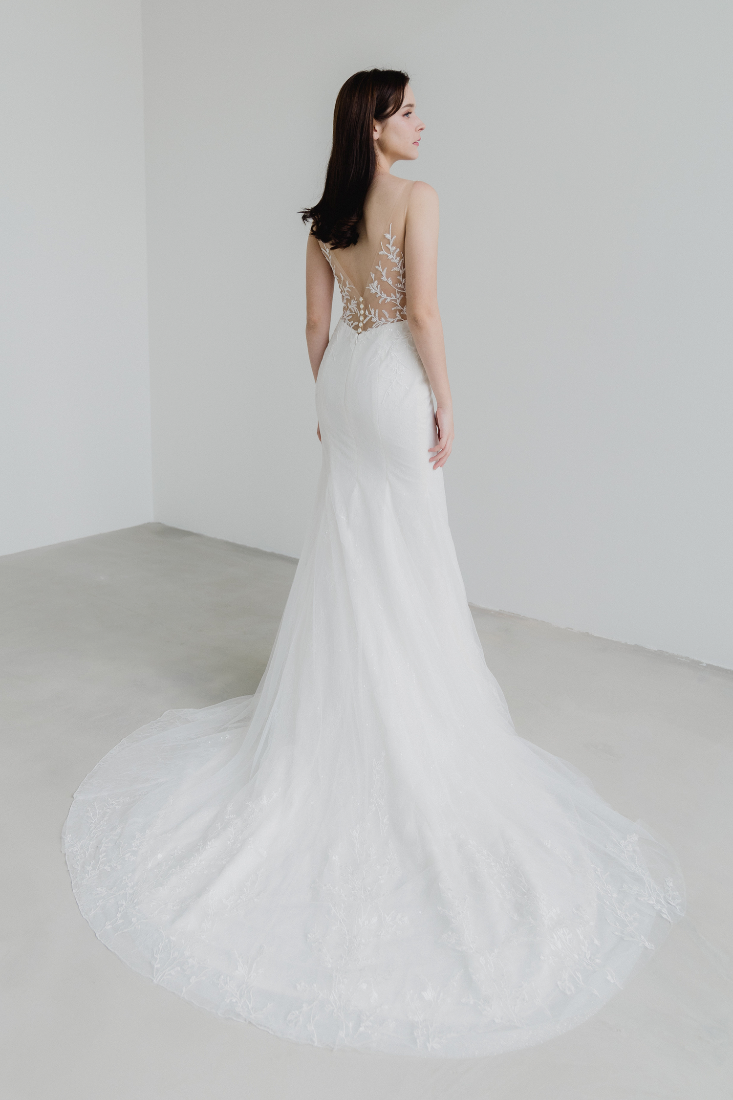 Franca bridal gown side view with fitted mermaid silhouette