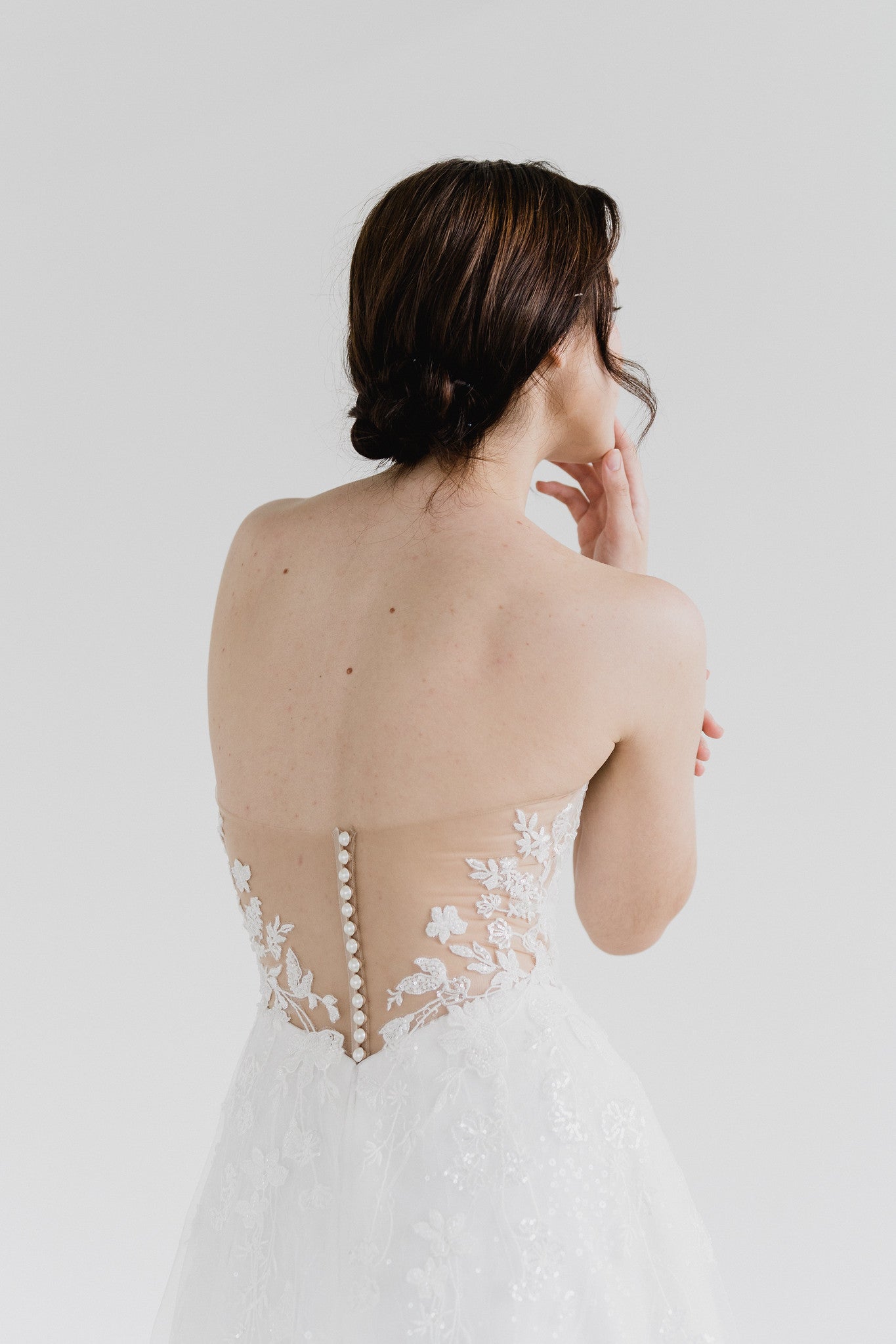 Genith wedding dress back view with intricate beaded lace