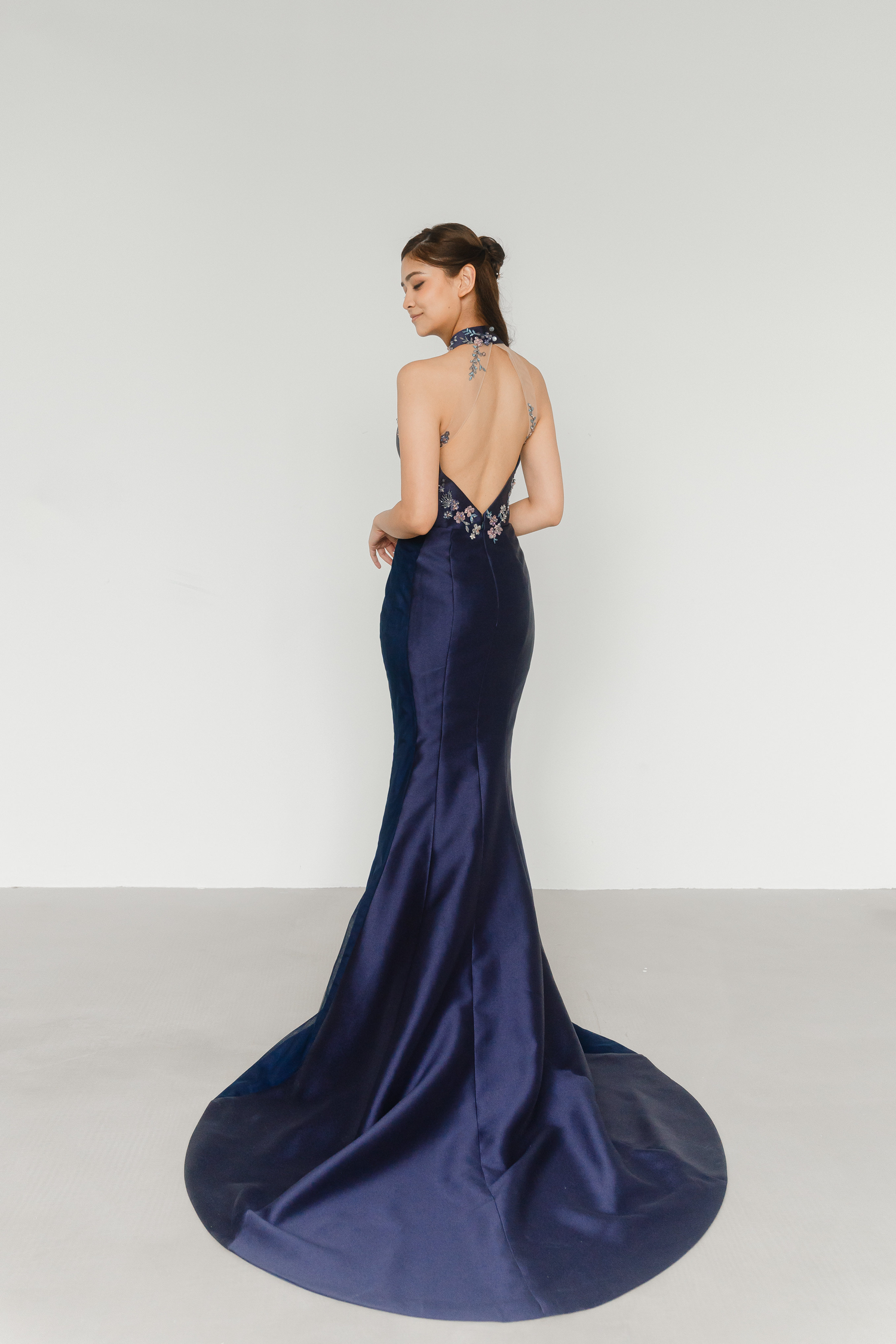 Gilda bridal cheongsam back view with a striking diamond back