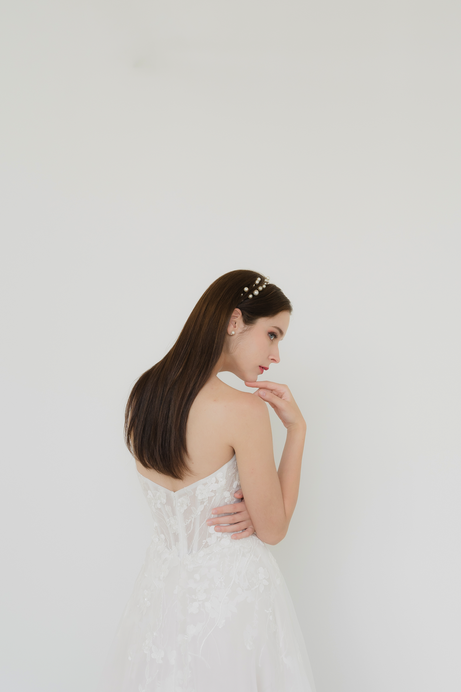 Gladys bridal gown back view with an elegant flowing silhouette