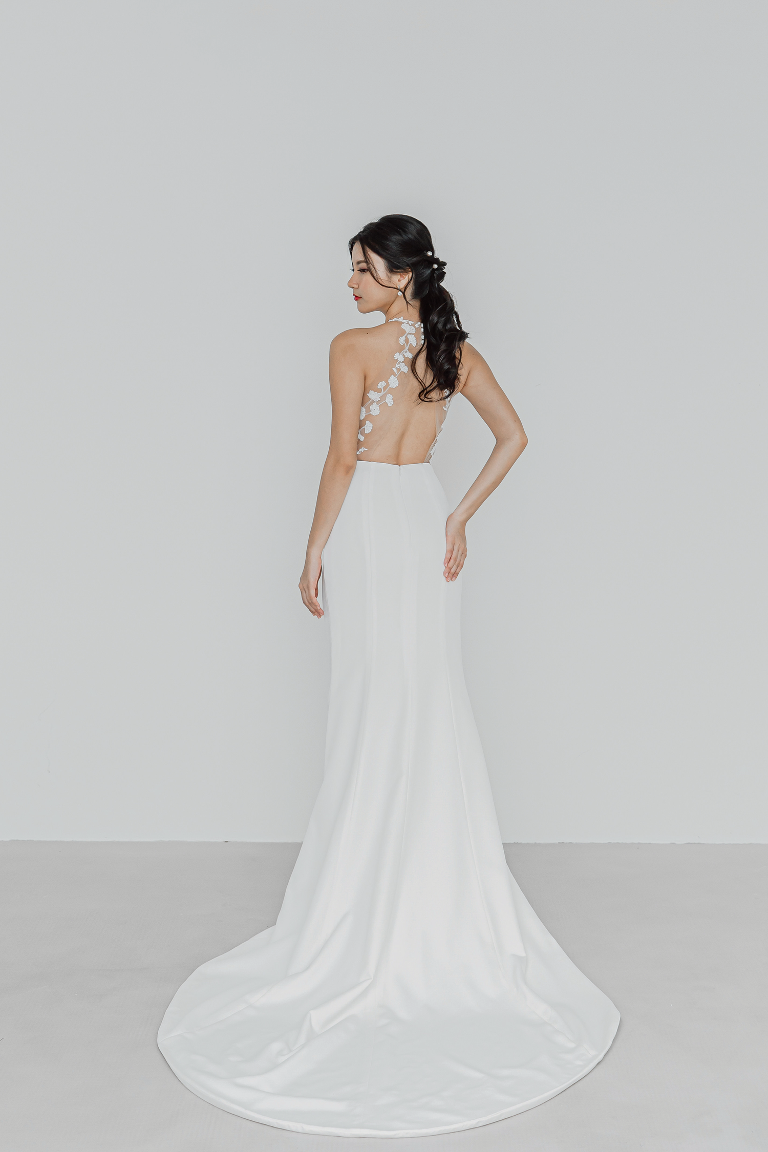 Gloria bridal gown back view with a stunning low back
