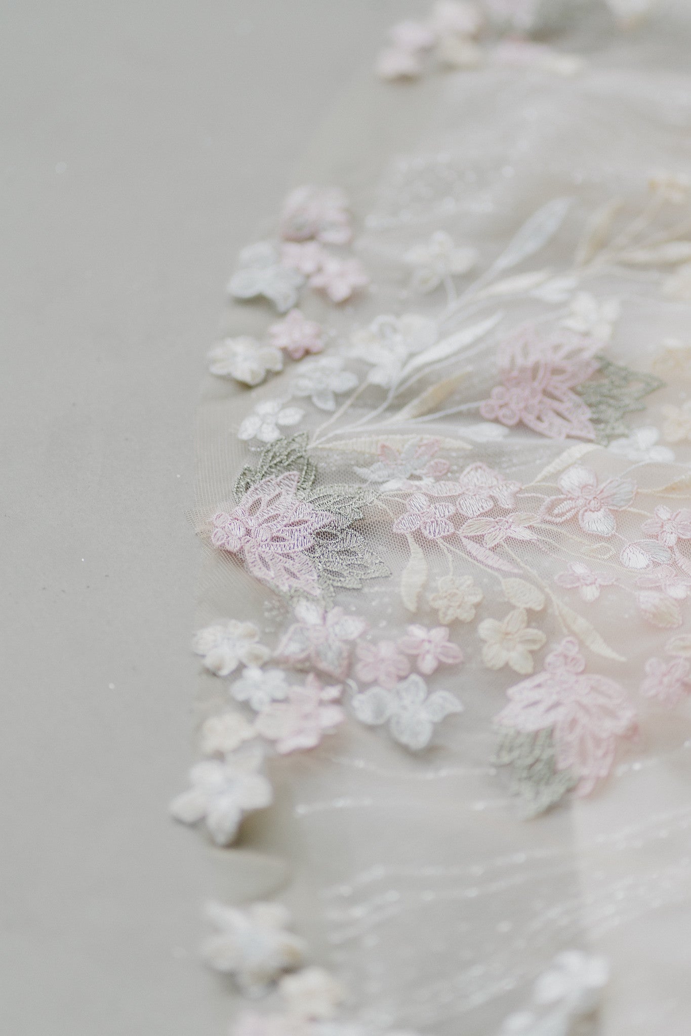 Close-up of Hana evening gown featuring blush glitter tulle and sweetheart neckline