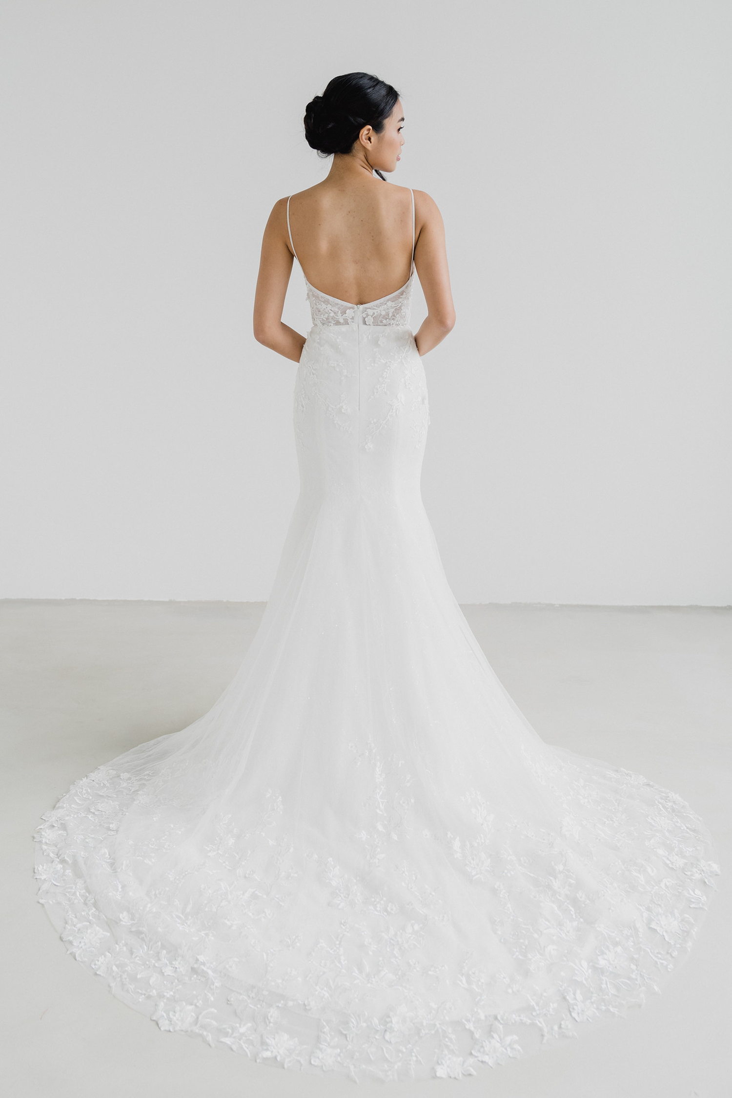 Inez wedding dress featuring a soft lace train