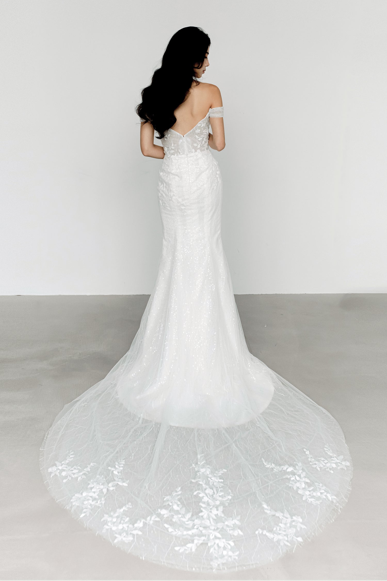 Josie bridal gown train showcasing the shimmering sequinned fabric and elegant train