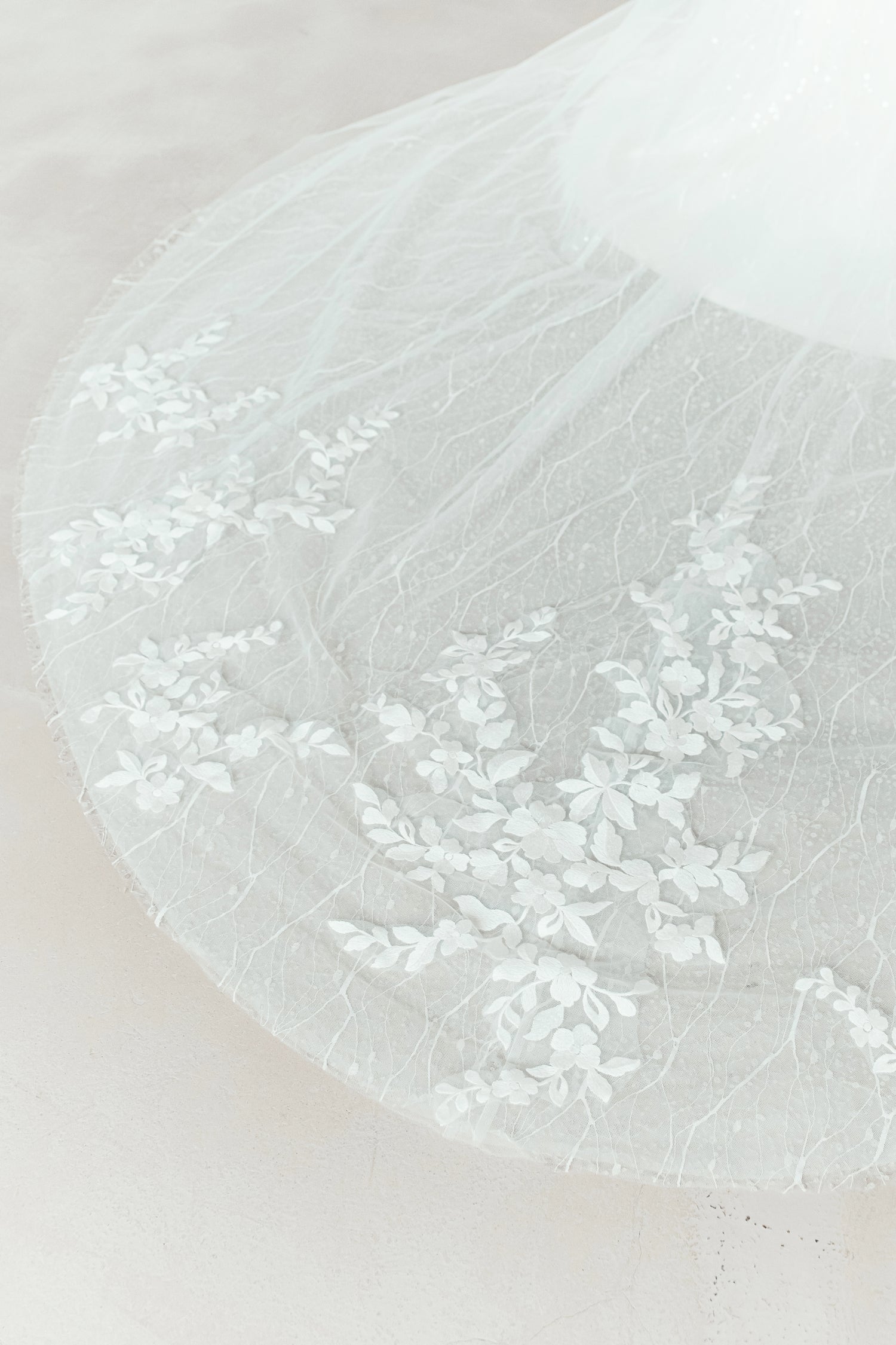 Close-up of Josie wedding dress highlighting the delicate floral lace detailing