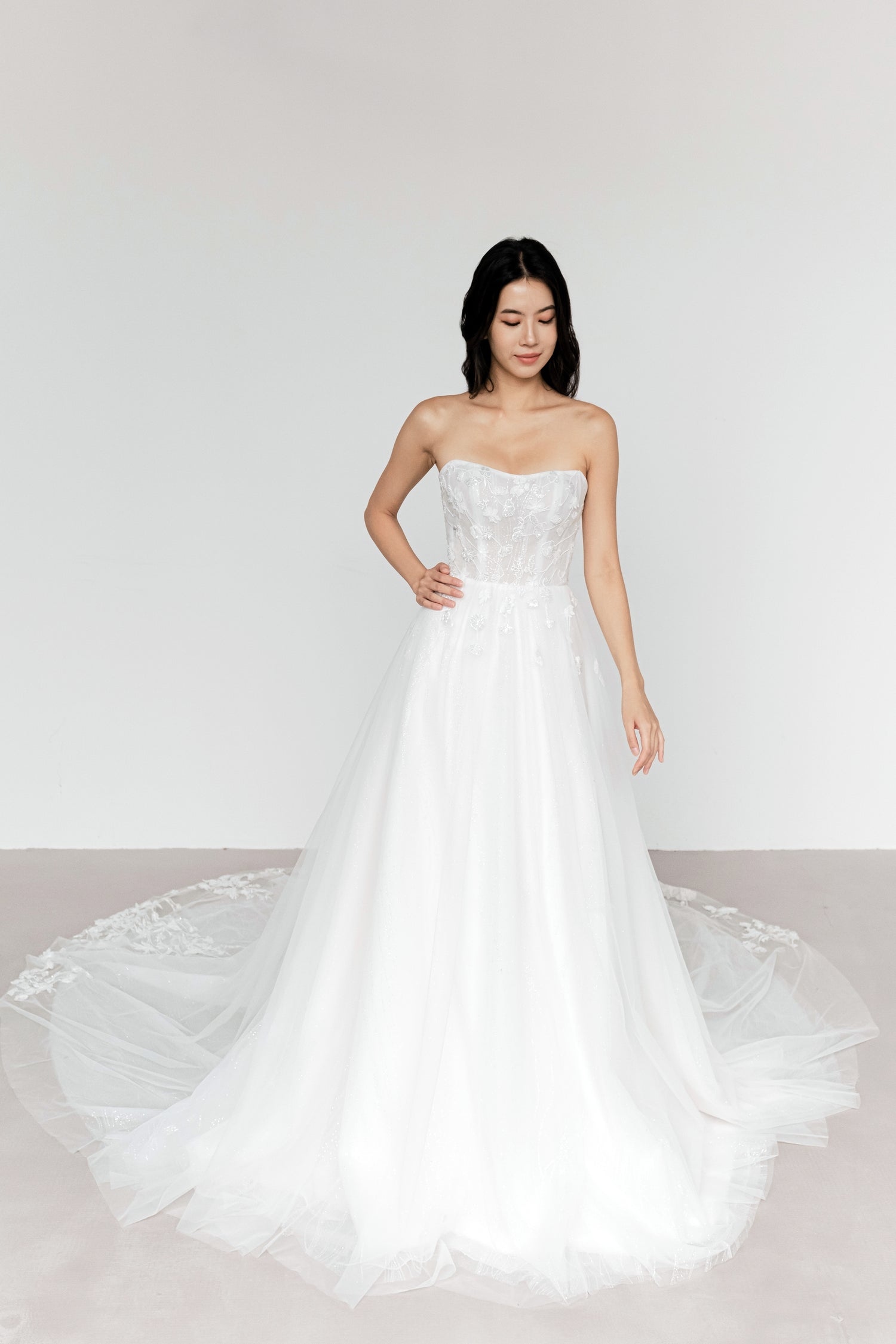 Judith bridal gown featuring shimmering glitter fabric and an elegant ballgown silhouette