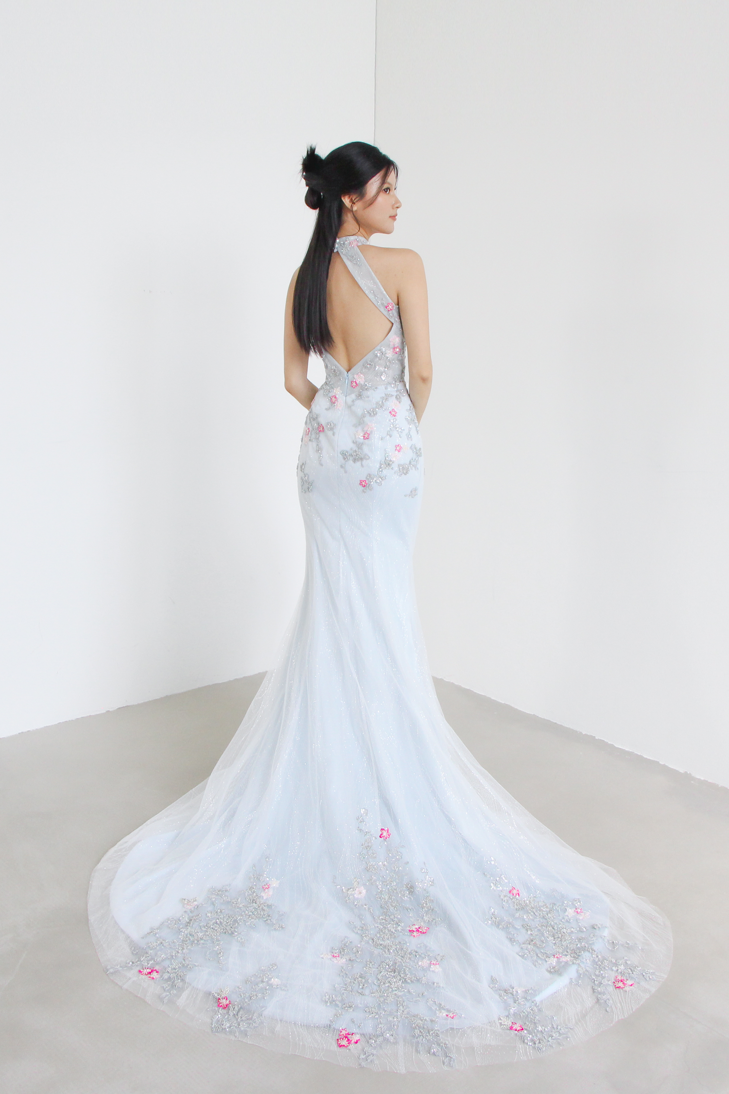 Kaira wedding cheongsam train showcasing the intricate silver beaded lace and elegant silhouette