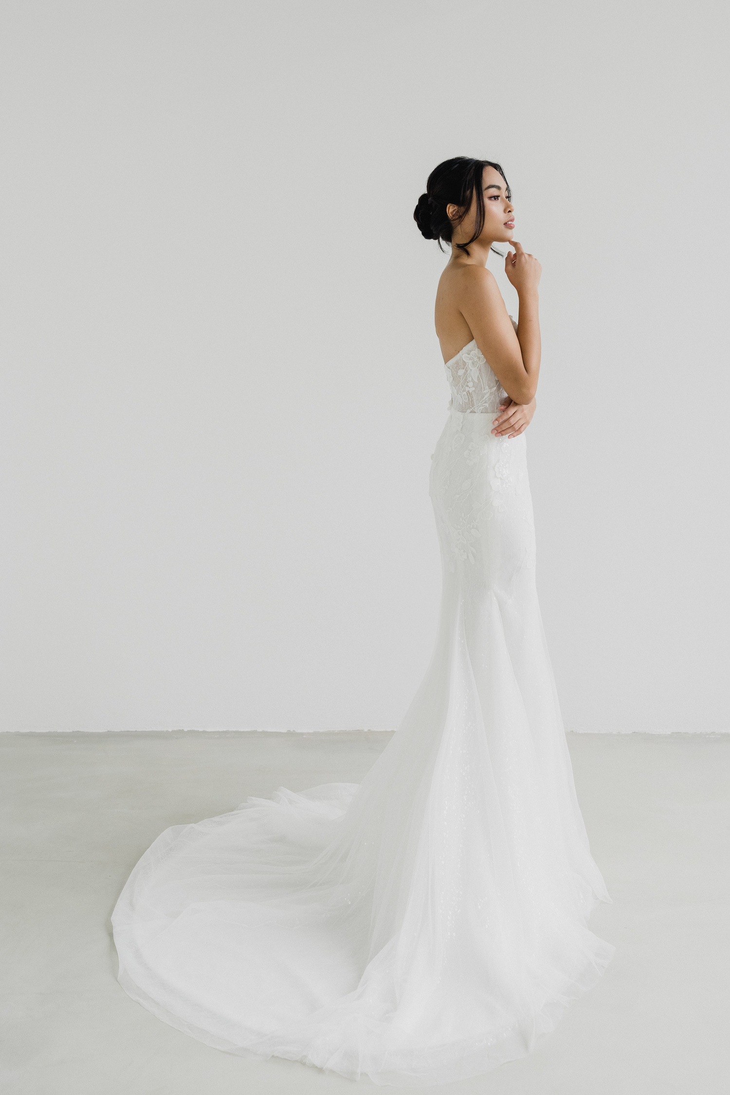 Katrina wedding dress side view with a fitted silhouette