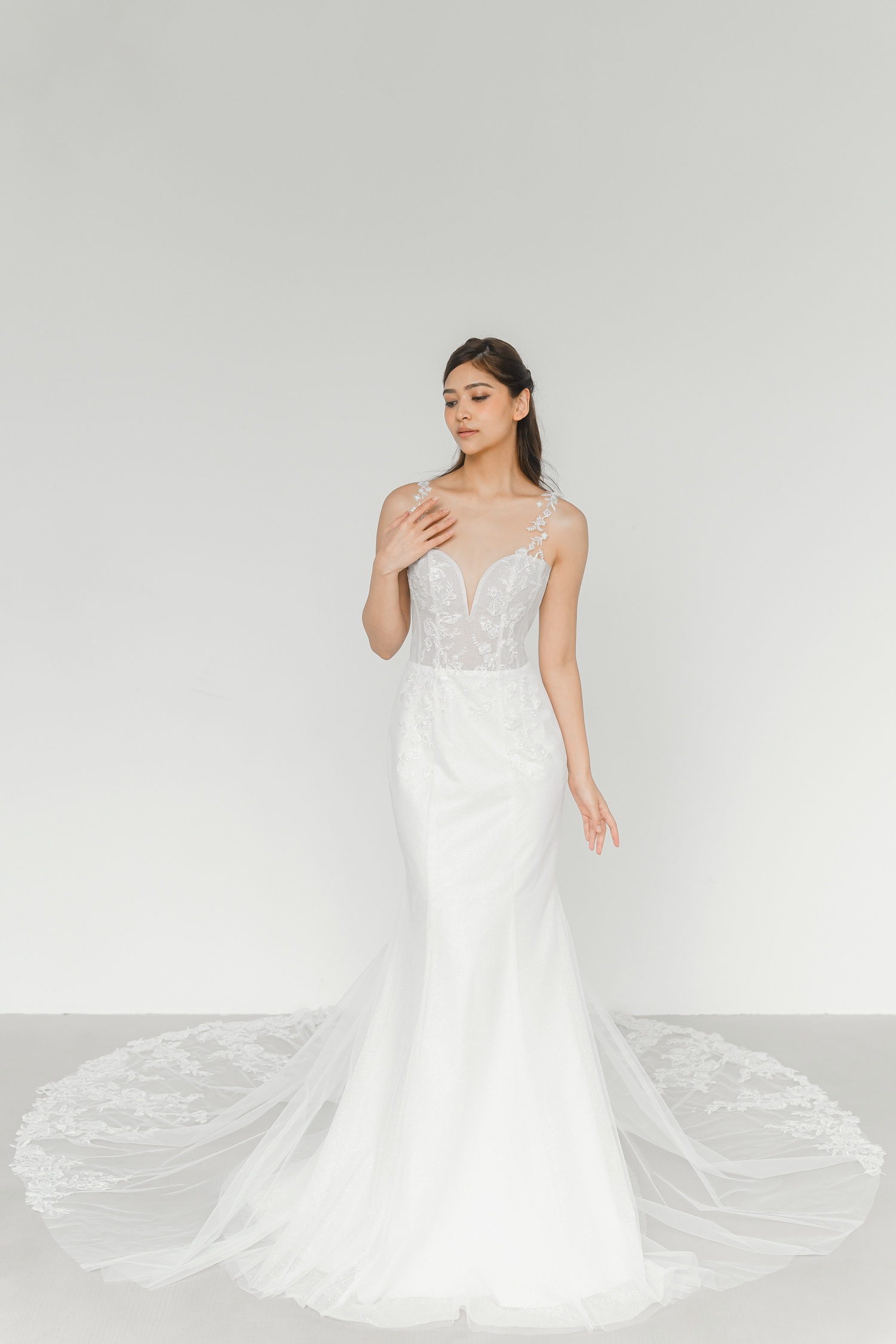 Kinsley bridal gown front view with sequinned lace and a mermaid silhouette