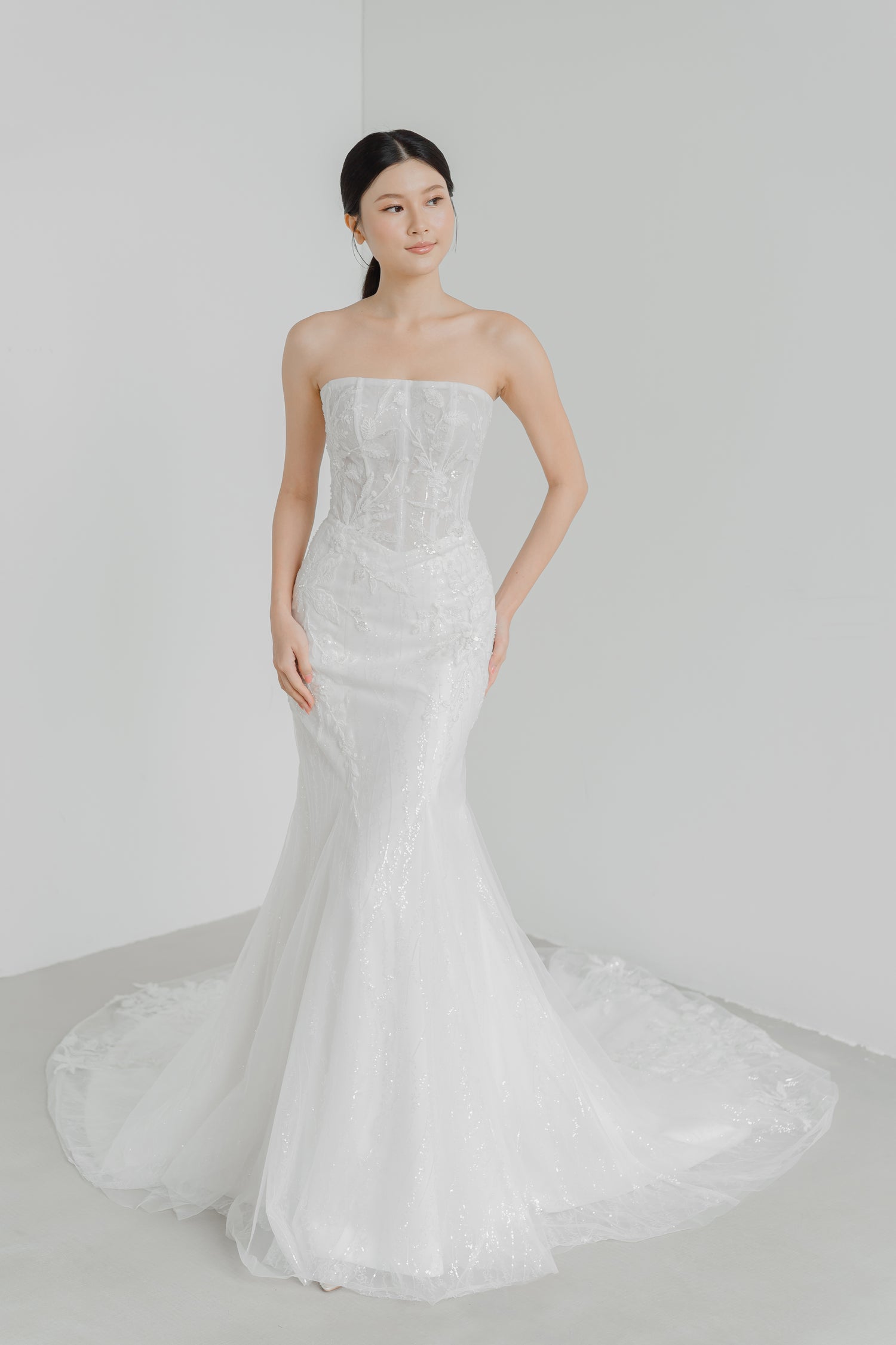 Kylie bridal gown front view with a modern straight neckline and sculpted hourglass silhouette