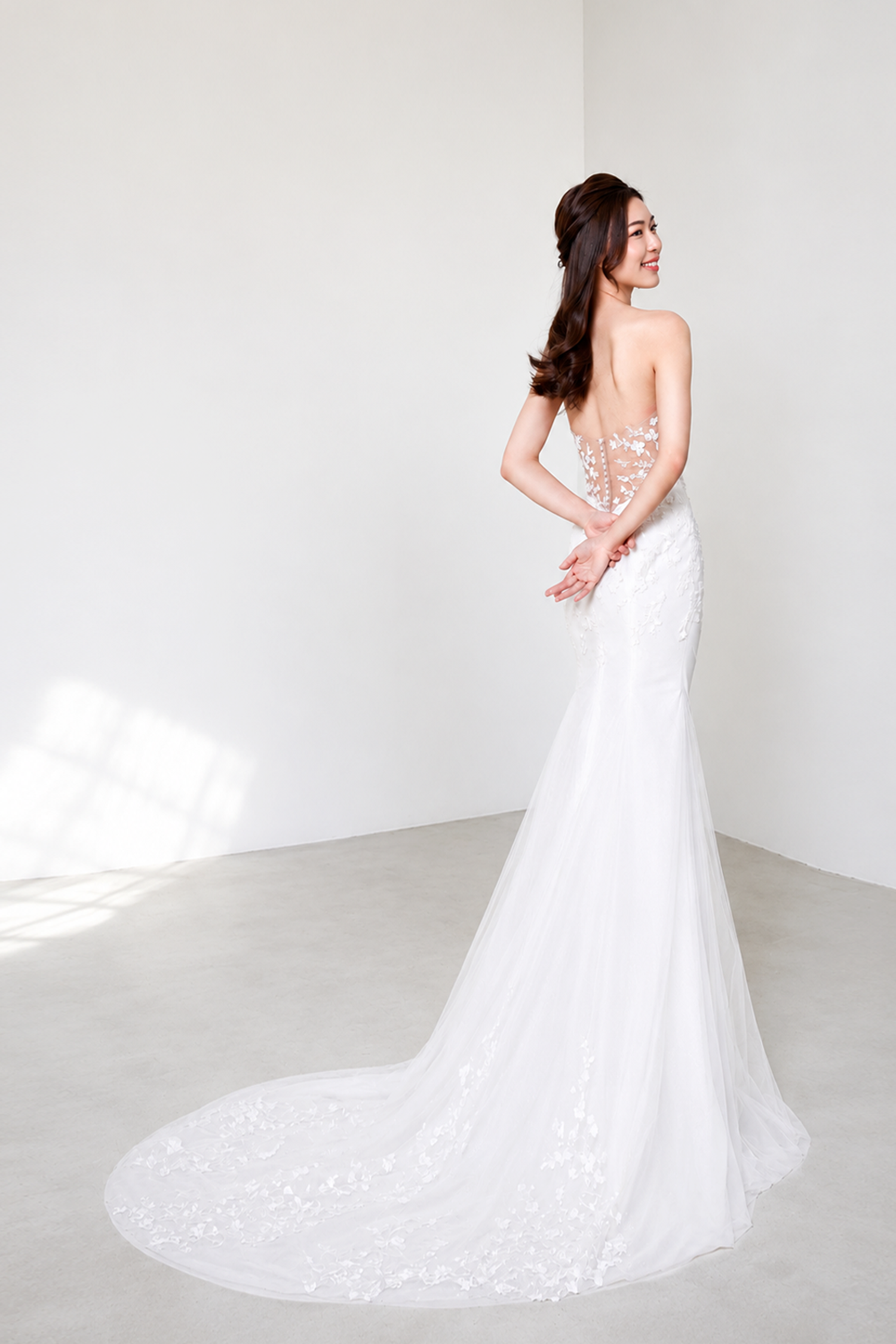 Laura bridal gown back view with intricate floral lace detailing