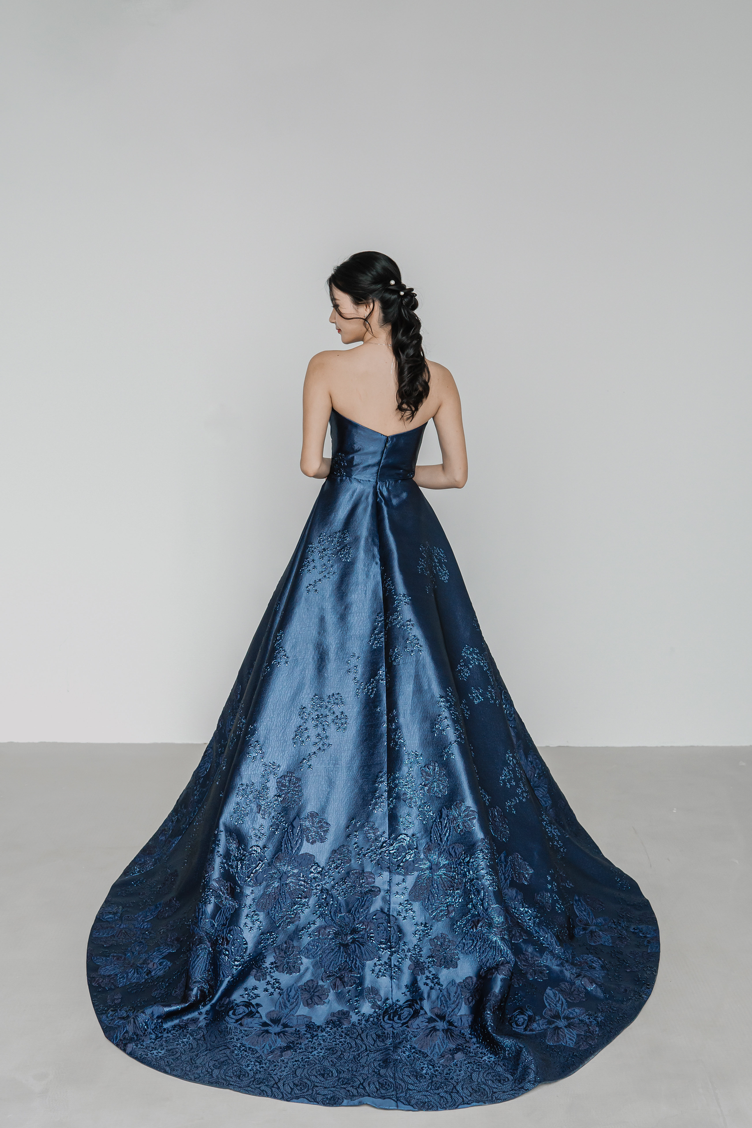 Leona evening dress back view with a flowing A-line silhouette
