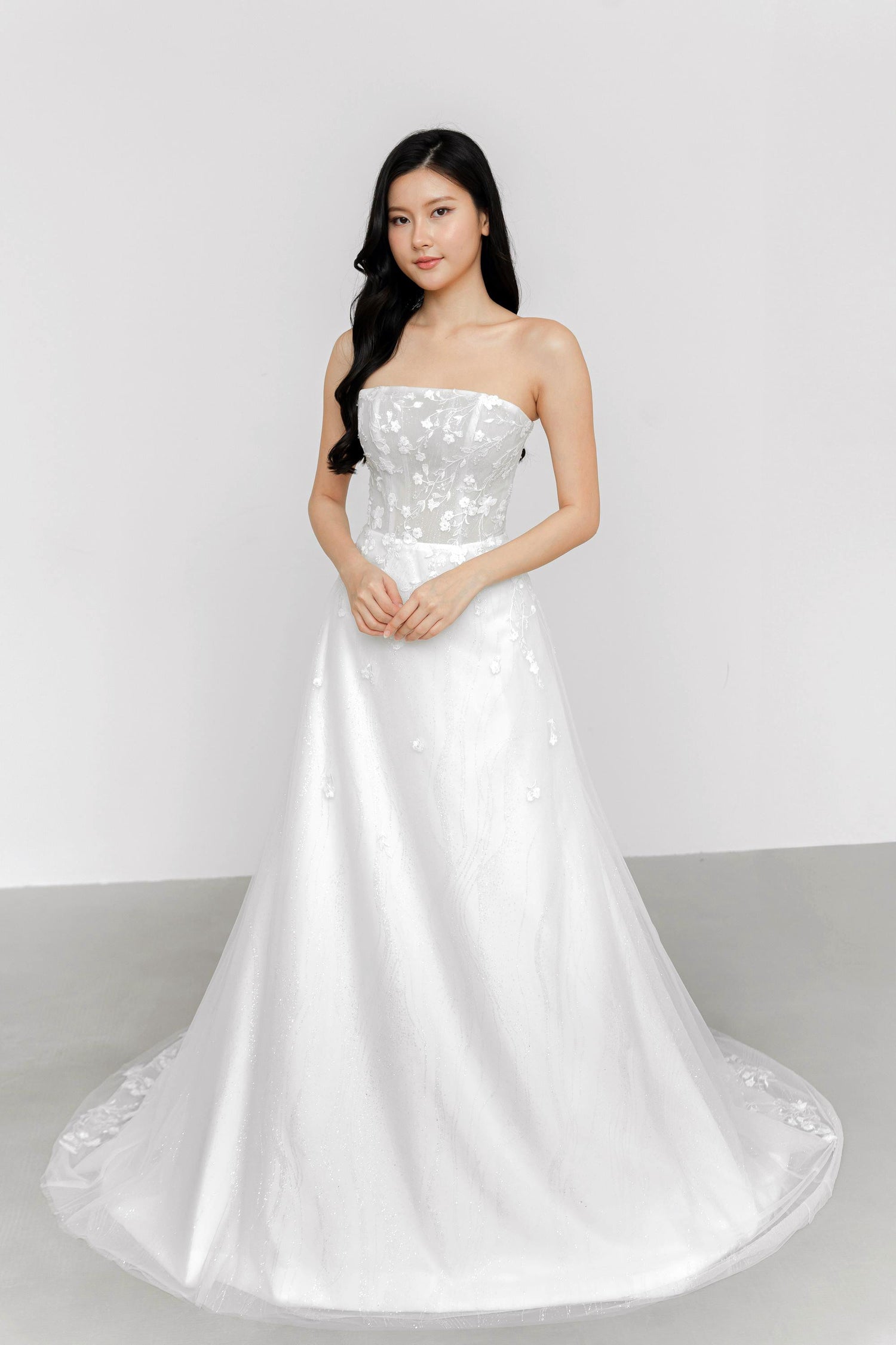 Mirelle bridal gown front view with a straight neckline and slim A-line silhouette