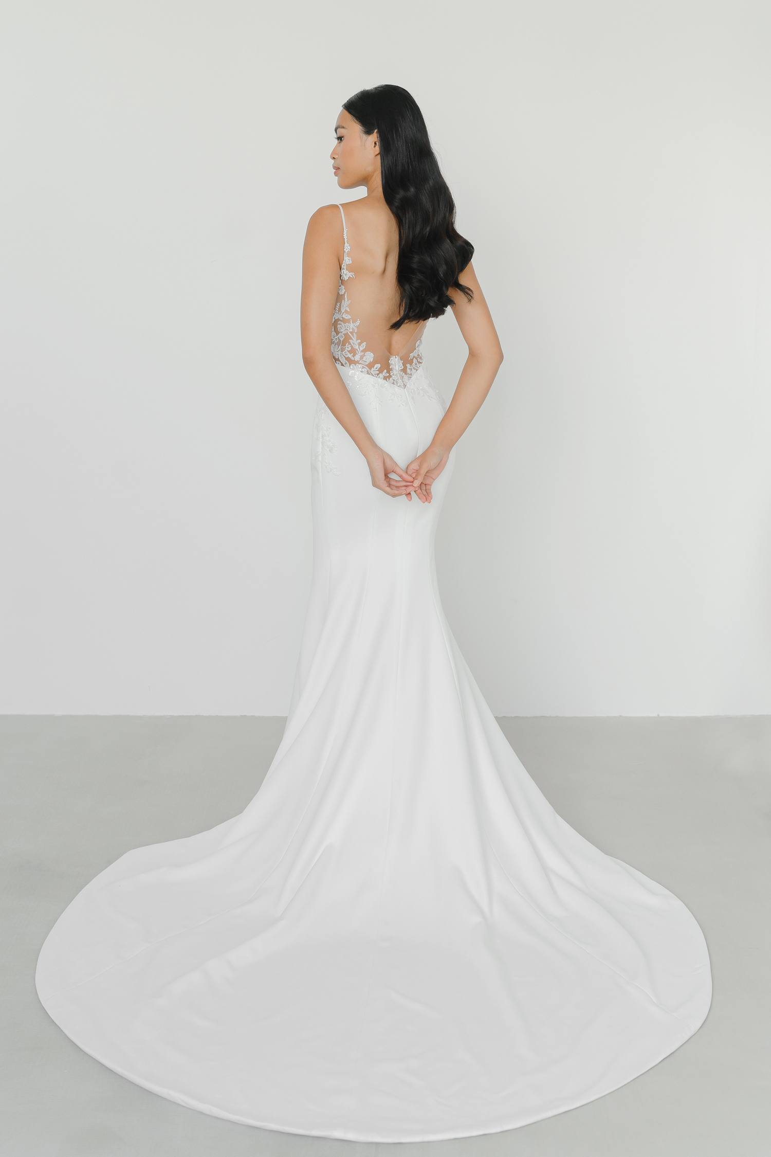 Natalie bridal gown back view with an illusion back and pearl button detailing