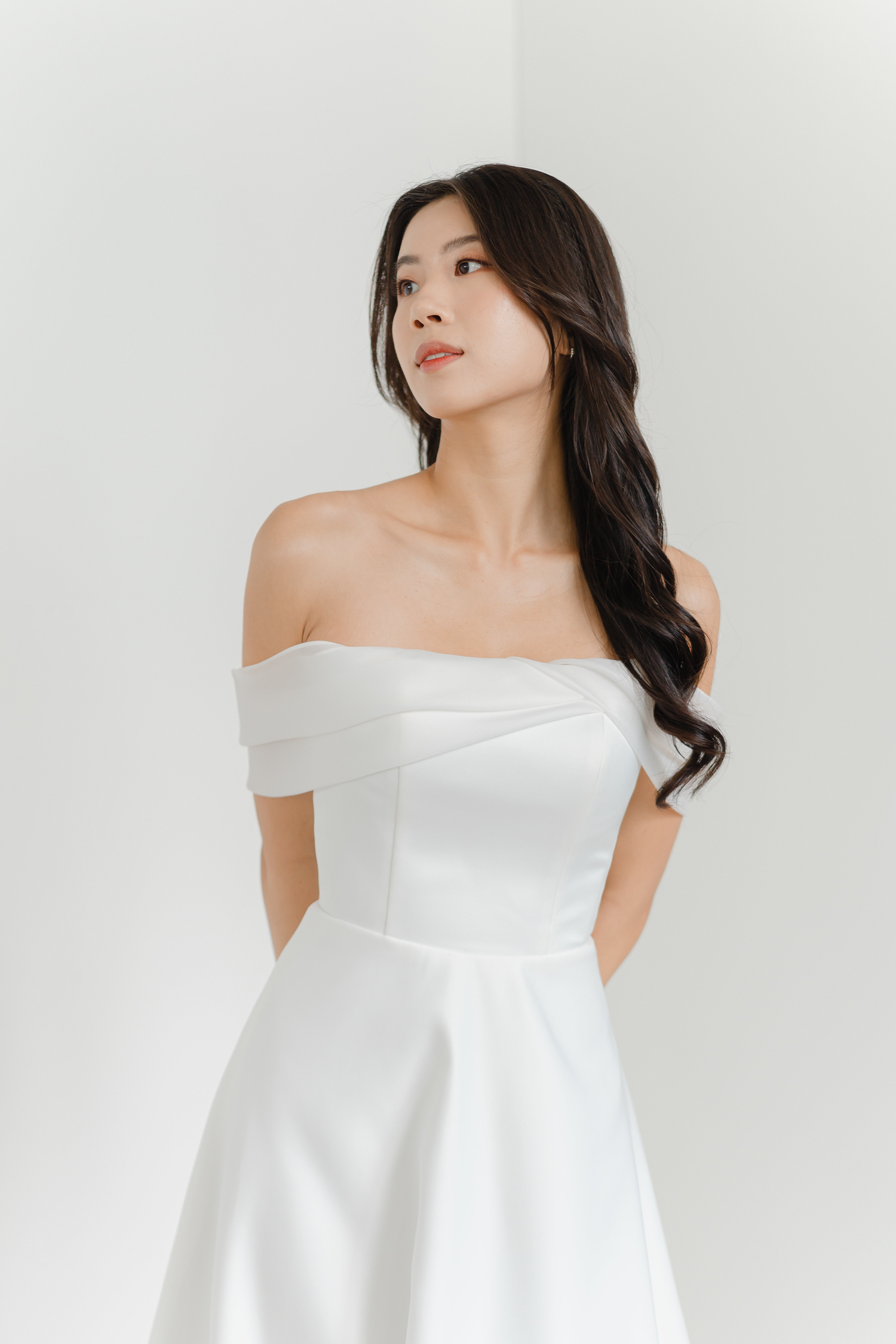 Odette bridal gown featuring light airy organza and detachable shoulder drapes