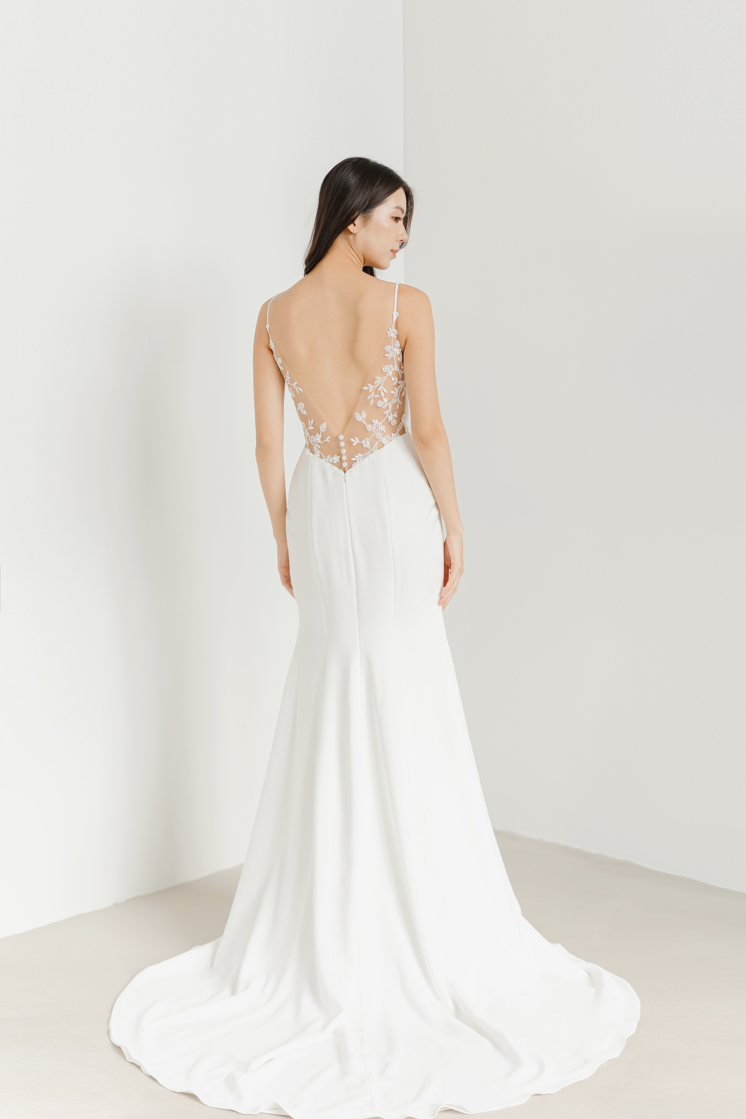 Raina bridal gown back view with a graceful low V-back