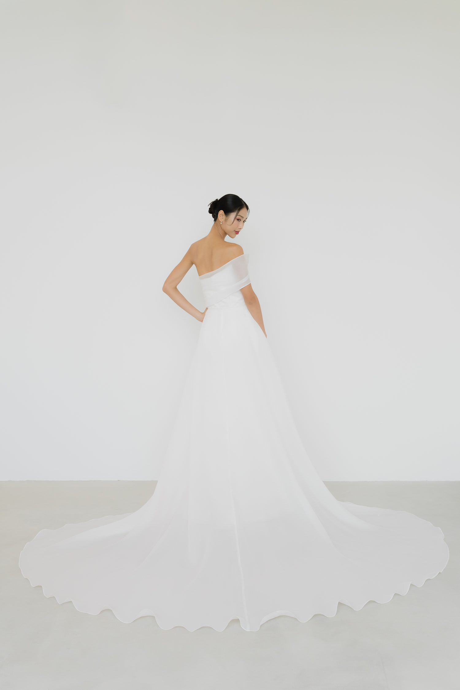 Sabrina bridal gown train showcasing the detachable organza overskirt and flowing train