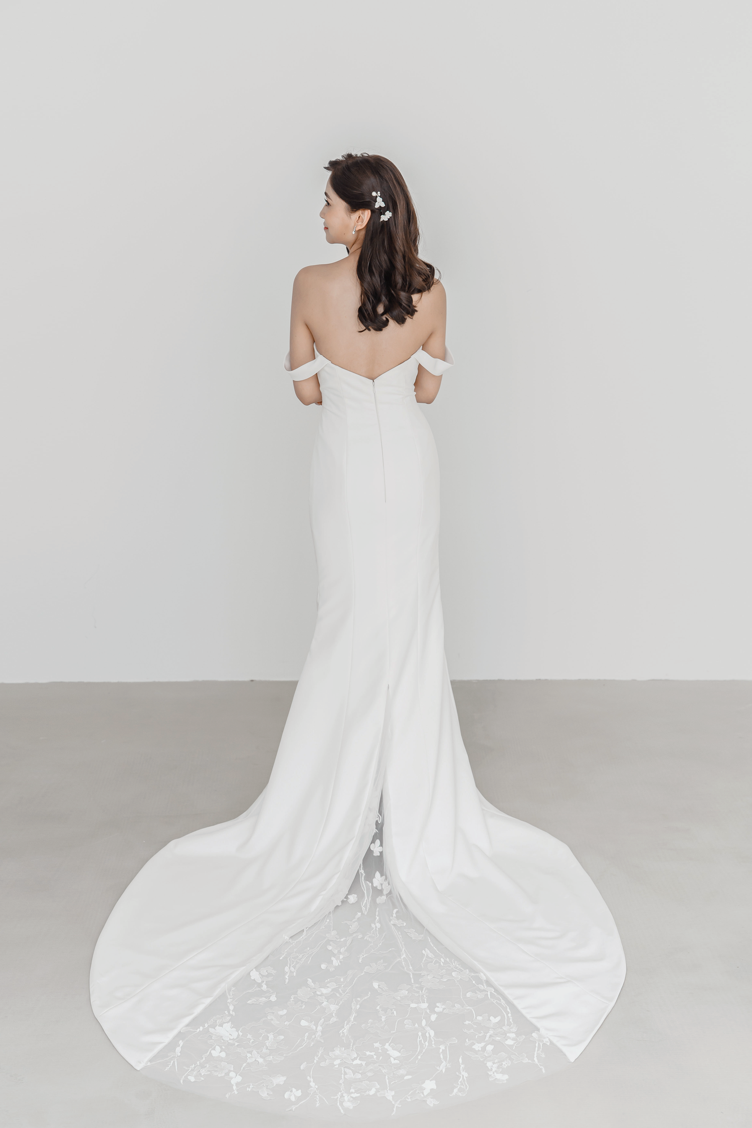 Shalyn bridal gown back view with a hidden peekaboo lace train