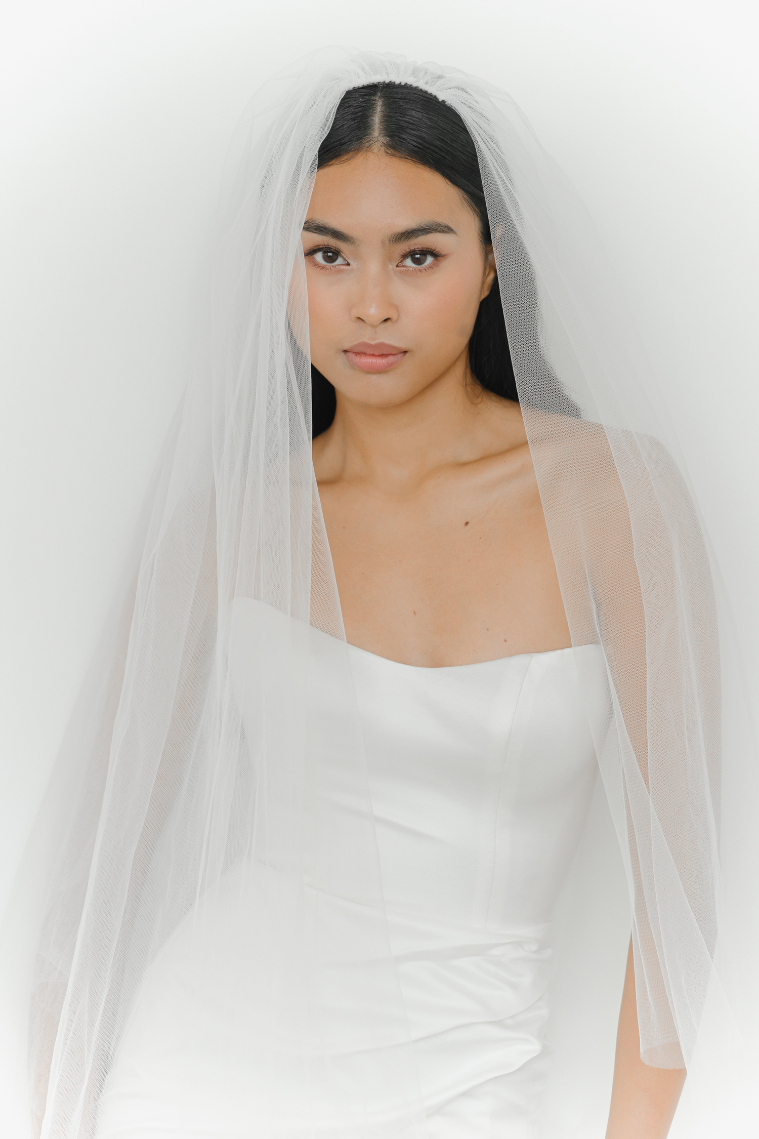 Close-up of Shanna bridal evening gown showcasing the clean scoop neckline