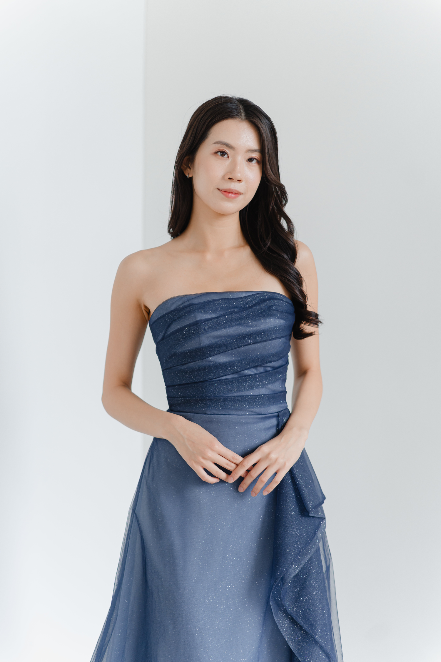 Sylvie bridal evening gown front view with a pleated straight neckline and A-line silhouette
