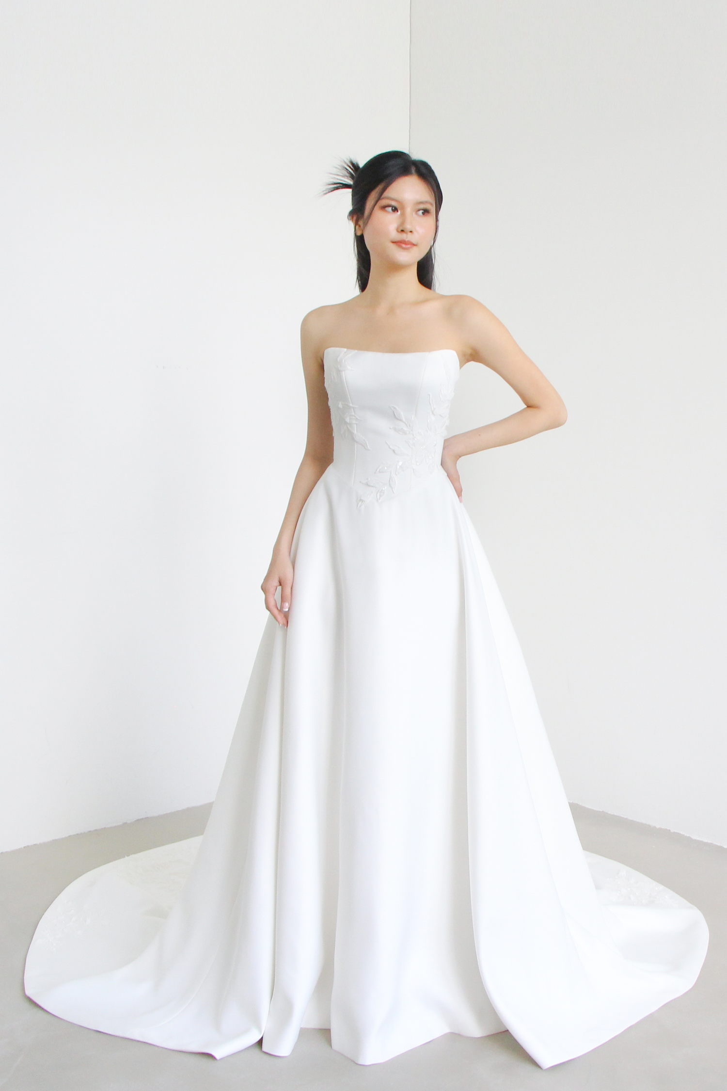 Vania wedding dress front view with sculpted basque waist