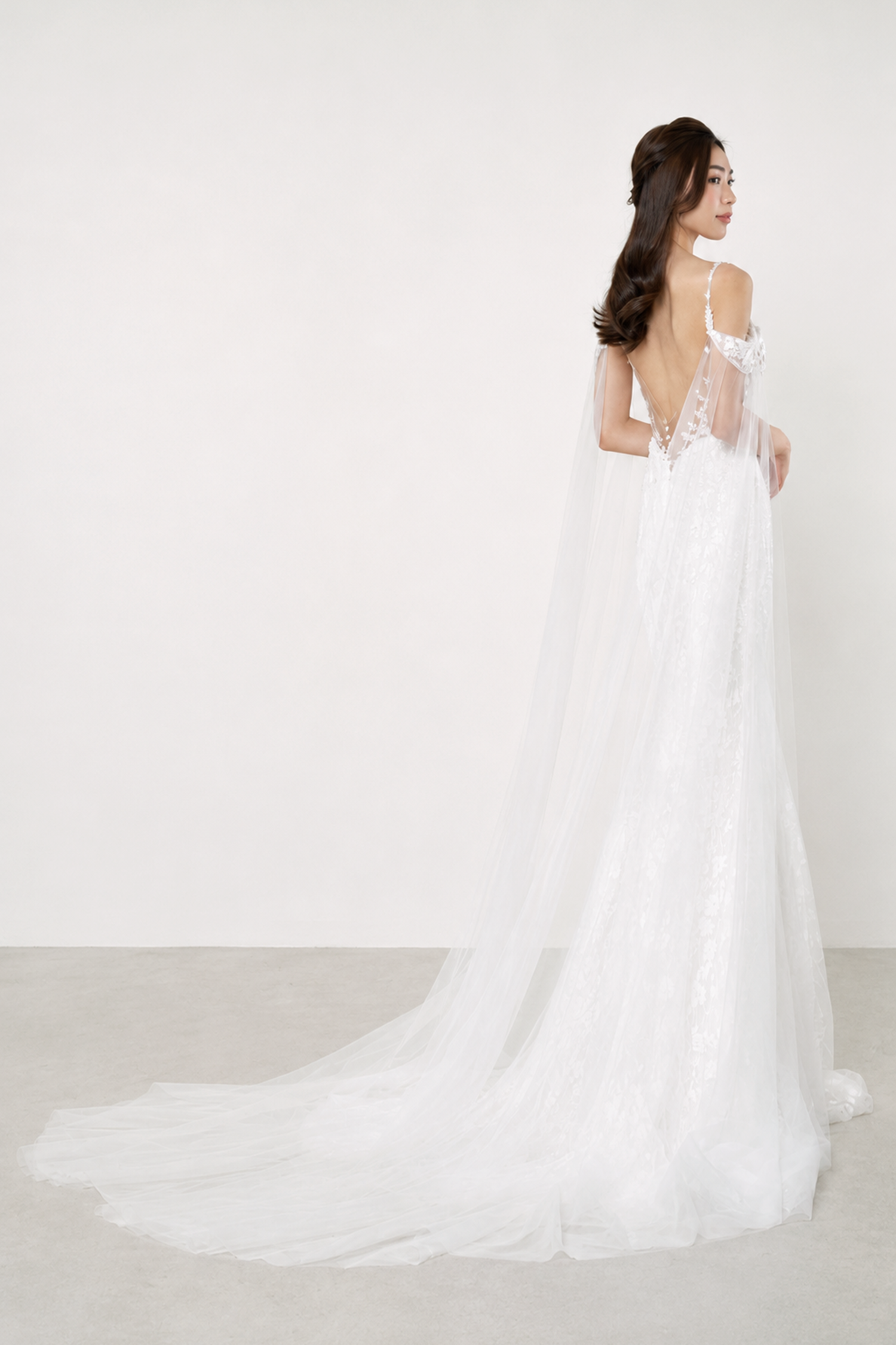 Veronica wedding gown train showcasing the intricate floral lace and graceful silhouette