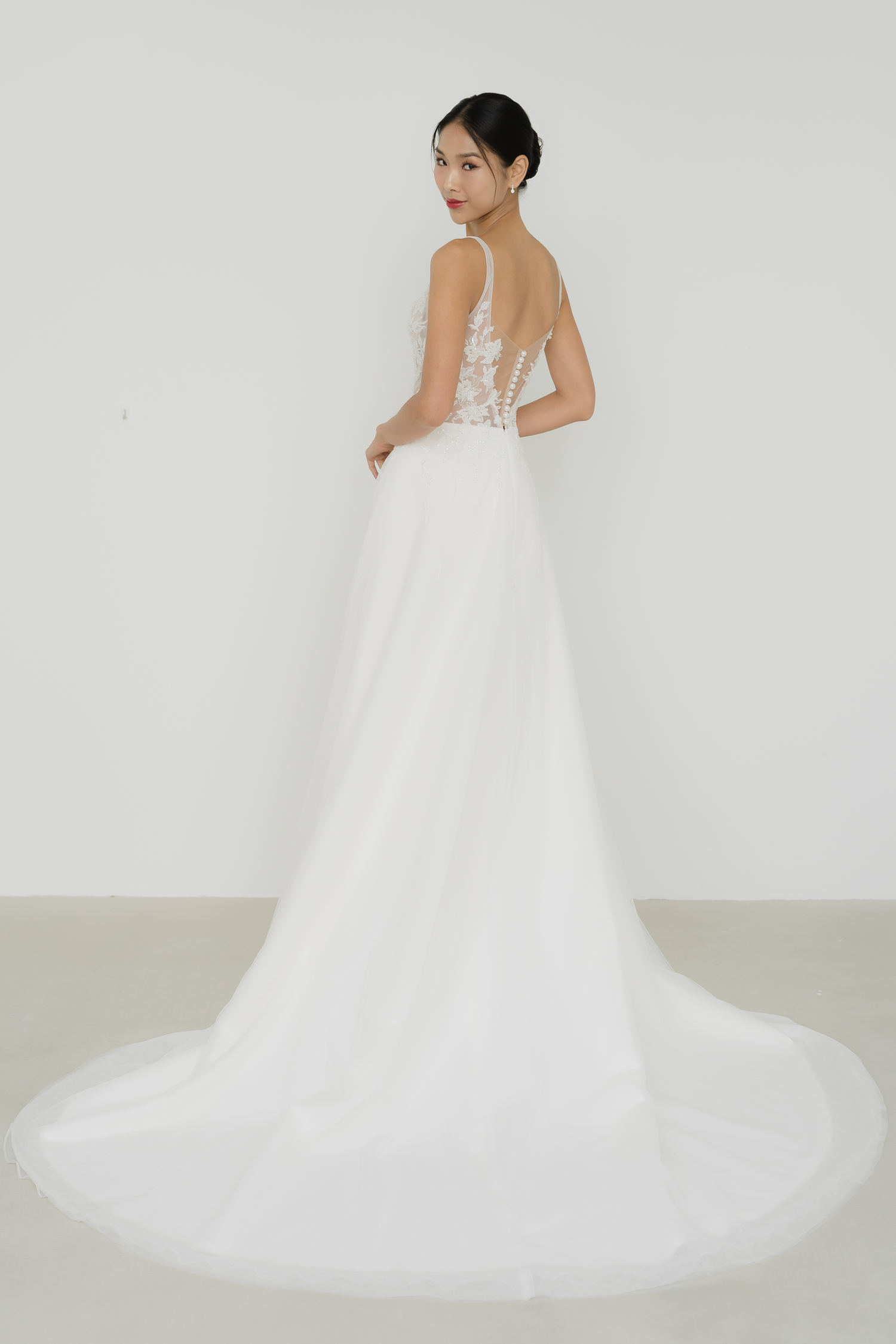 Willow wedding gown train showcasing the flowing skirt and graceful train