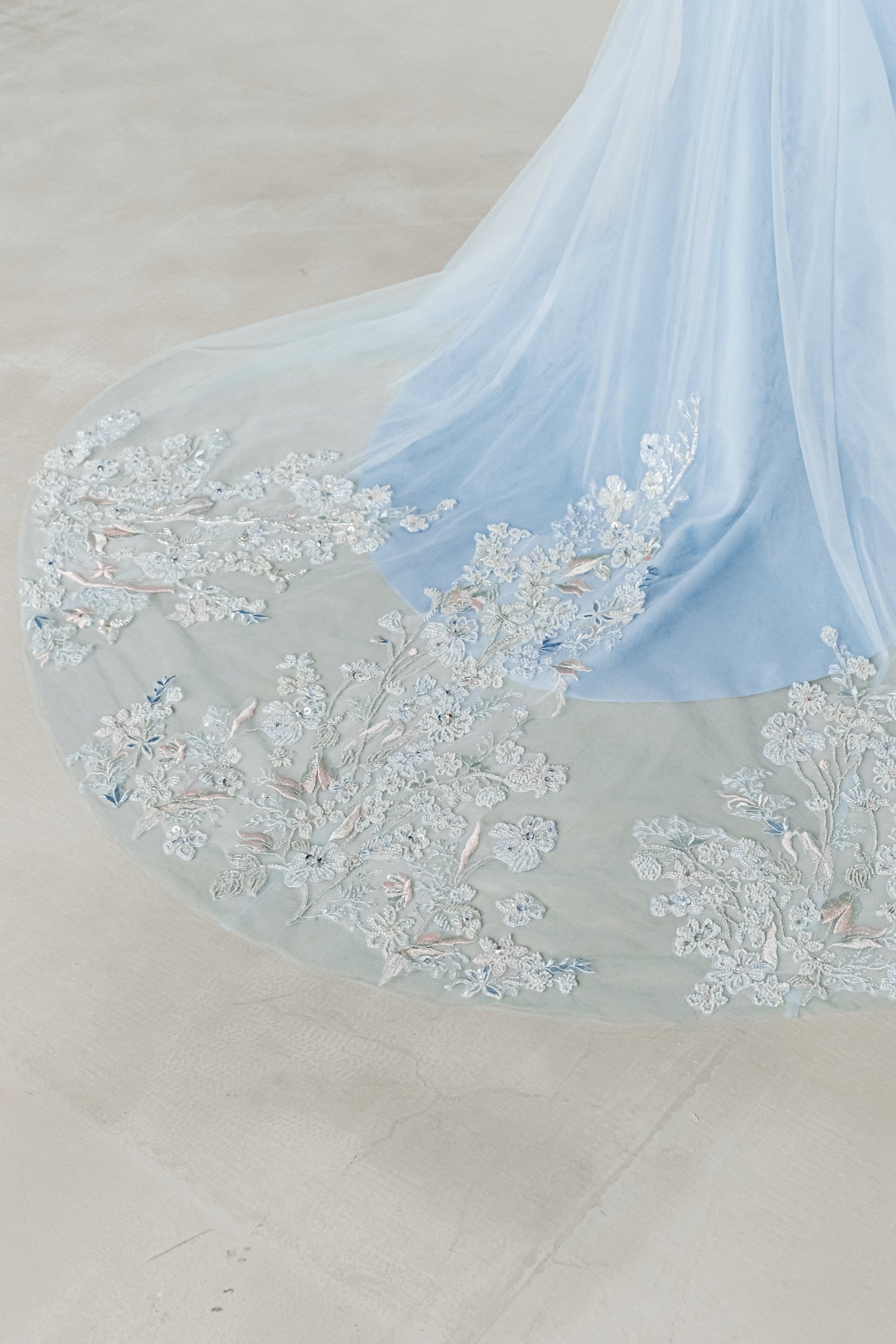 Close-up of Yuka bridal evening gown showcasing the detachable cheongsam overlay