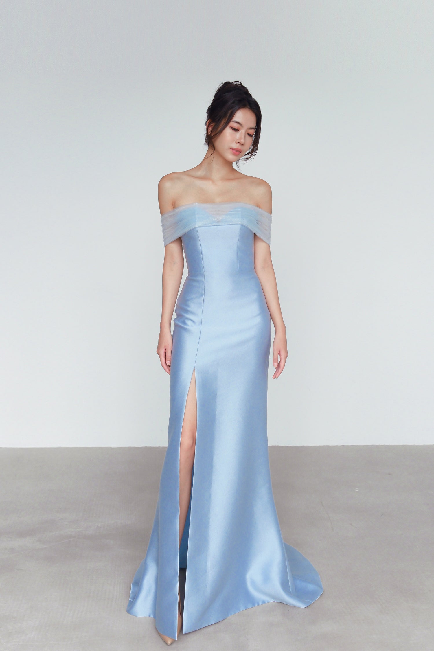 Close-up of Yuka wedding gown highlighting the detachable off-shoulder wrap