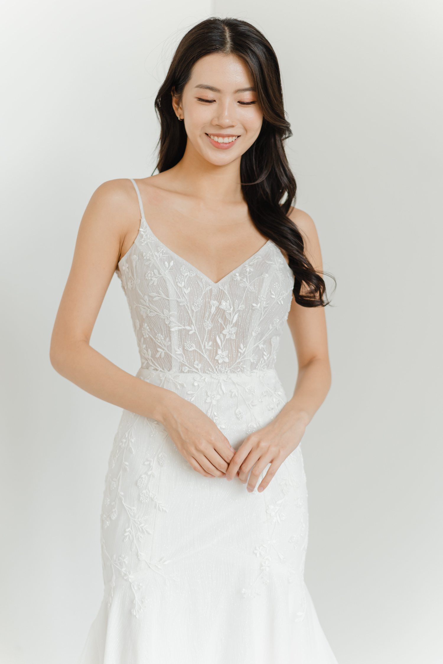 Yvonne bridal gown front view with delicate wildflower lace and a flattering hourglass silhouette