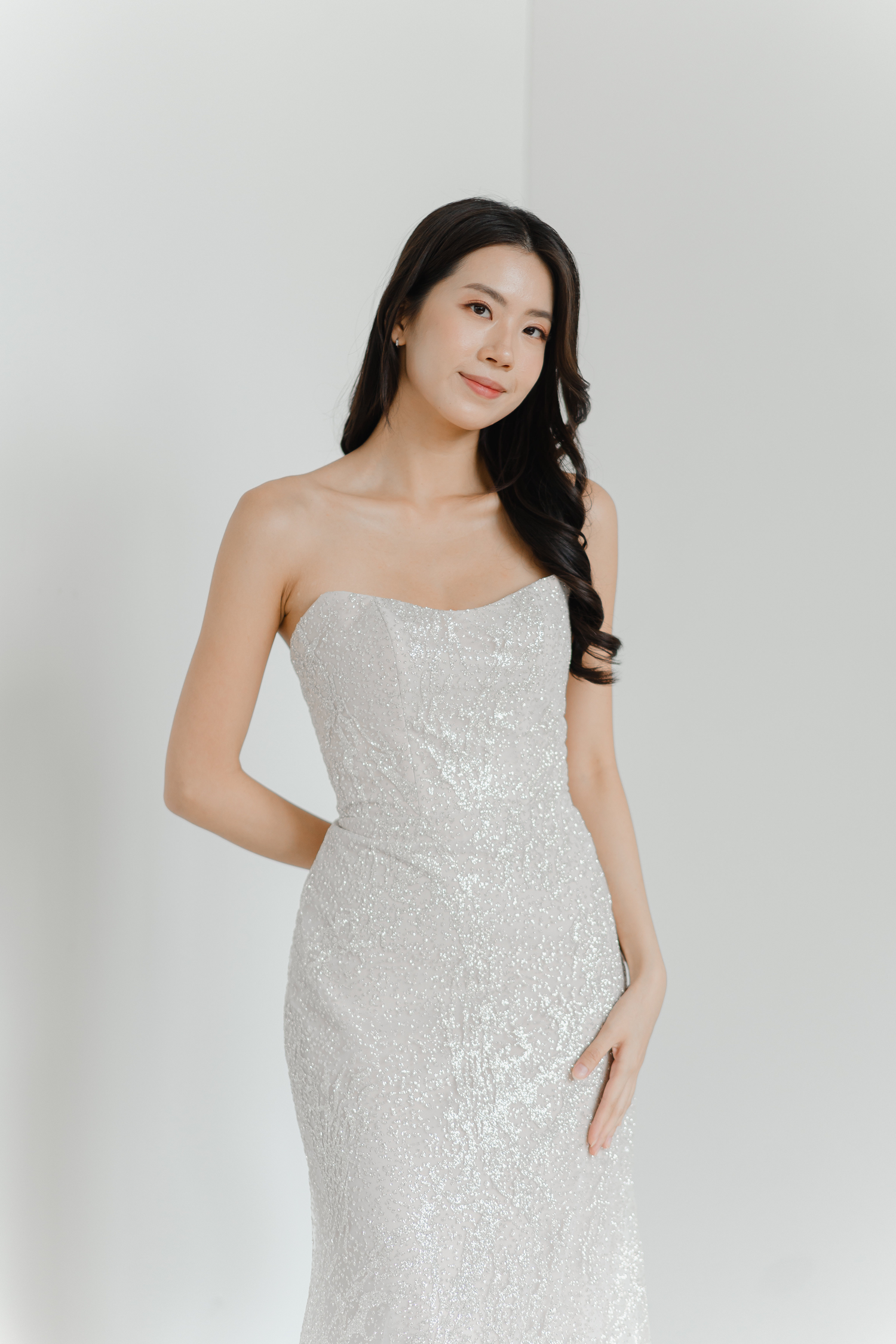 Zuri bridal gown front view with a scoop neckline and relaxed mermaid silhouette
