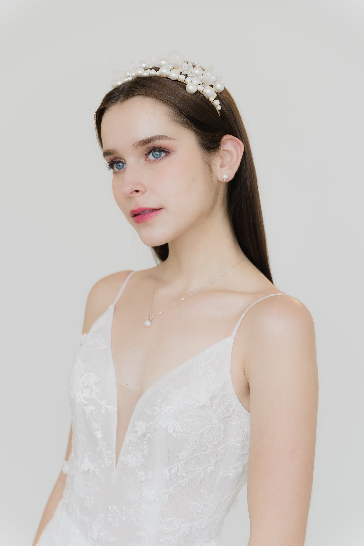 Close-up of Abigail wedding dress highlighting the delicate floral lace detailing