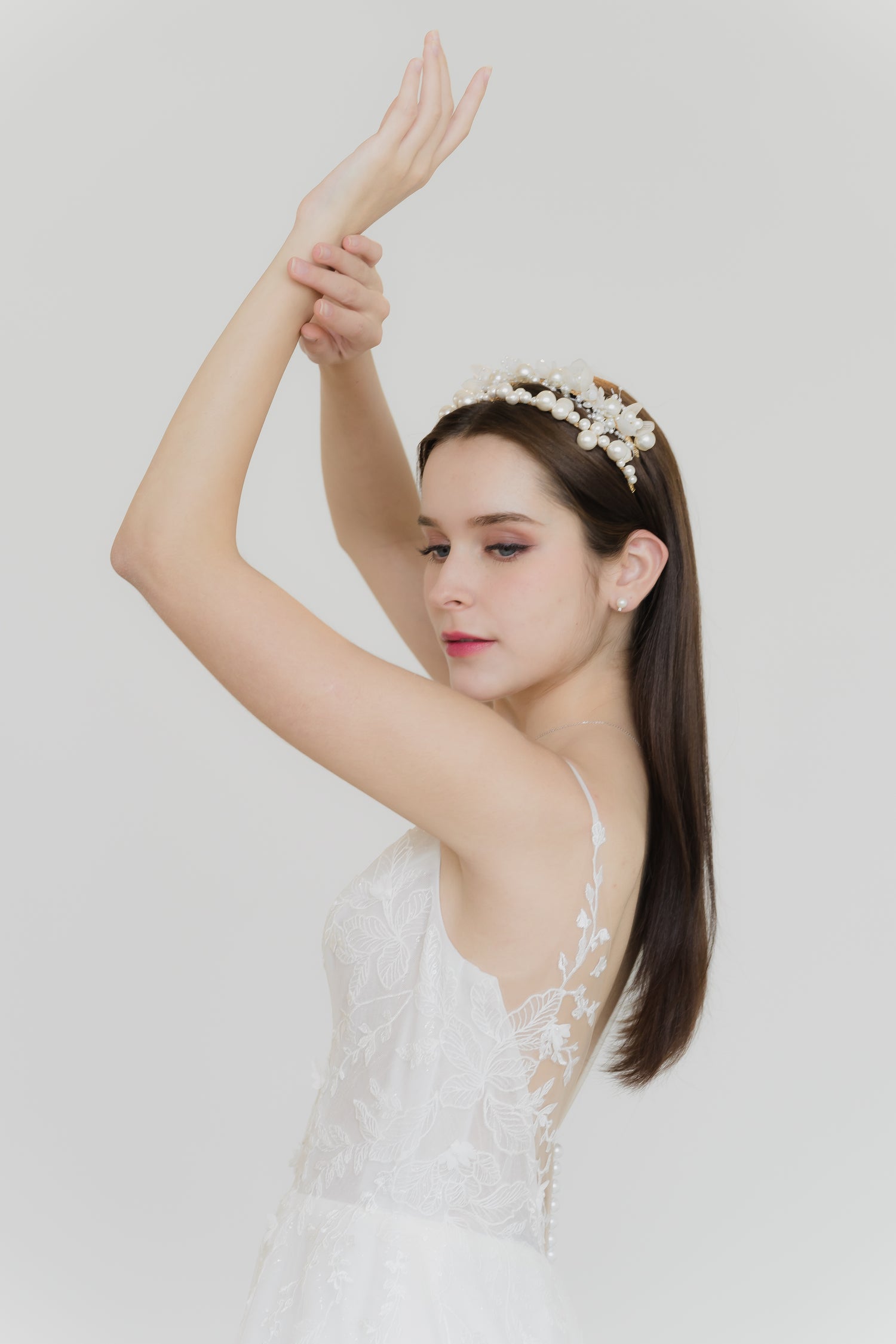 Abigail wedding gown side view with a flowing A-line silhouette