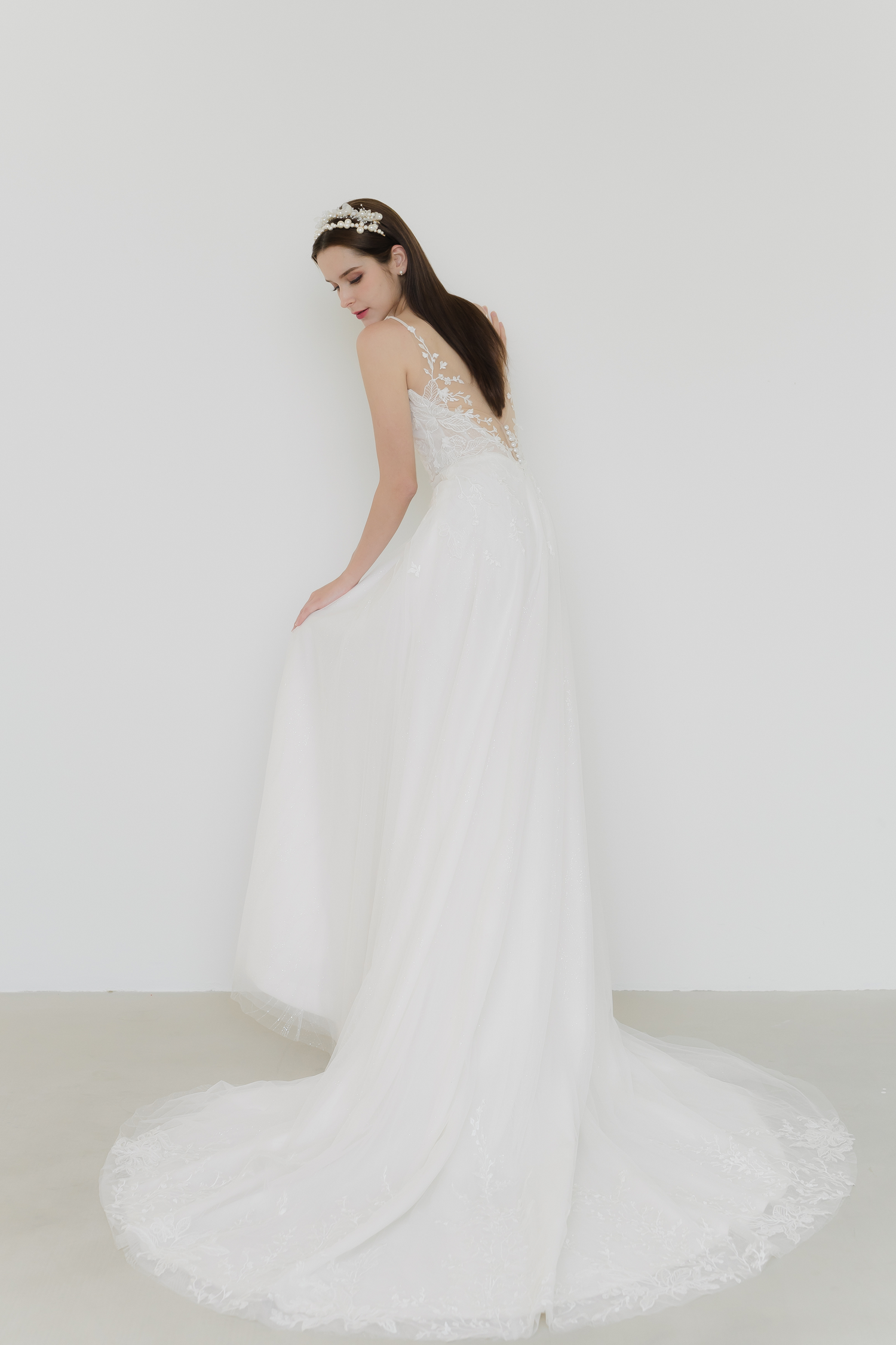 Abigail wedding gown side view with a flowing A-line silhouette