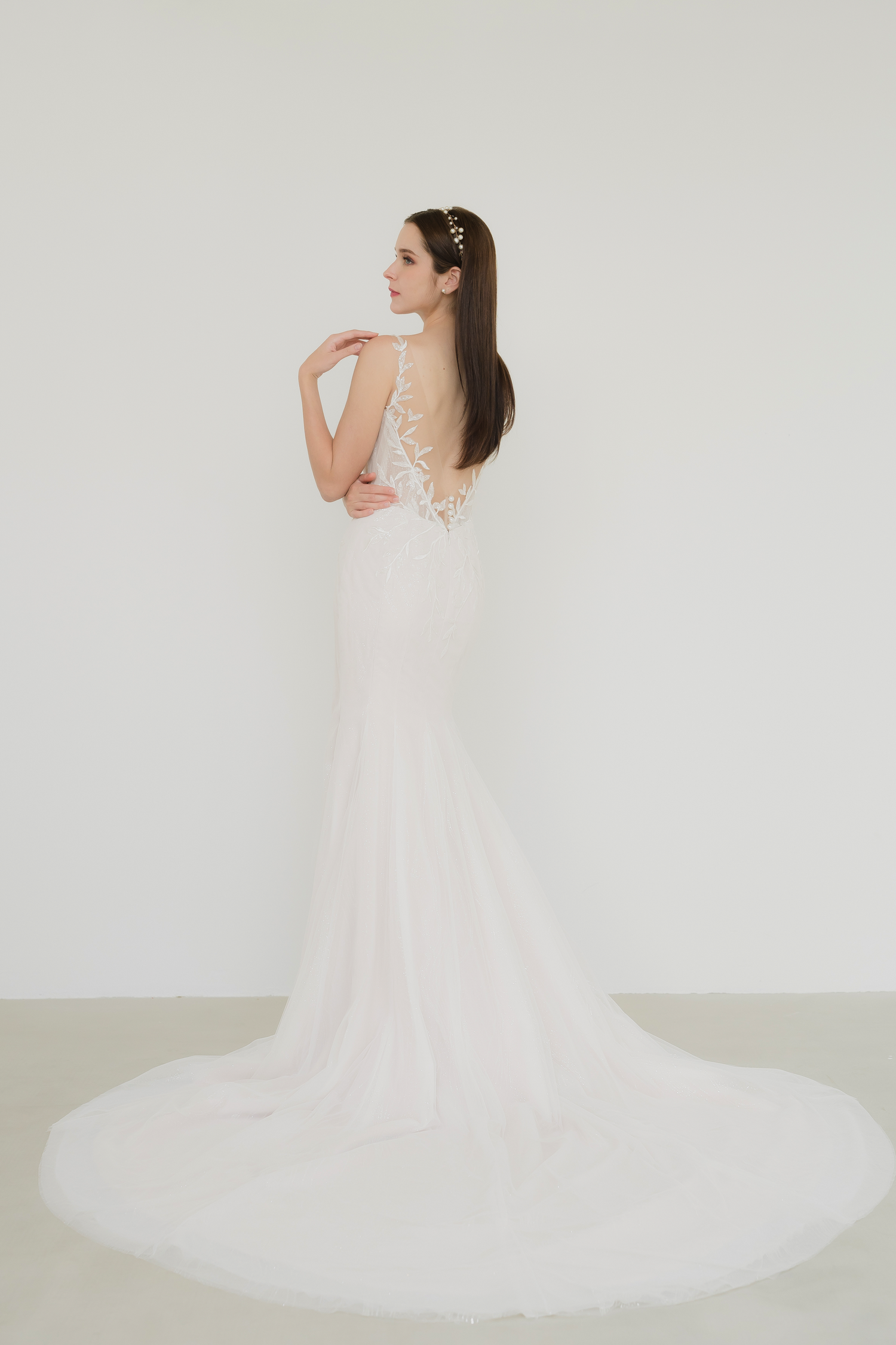 Alana wedding dress back view with a graceful low back