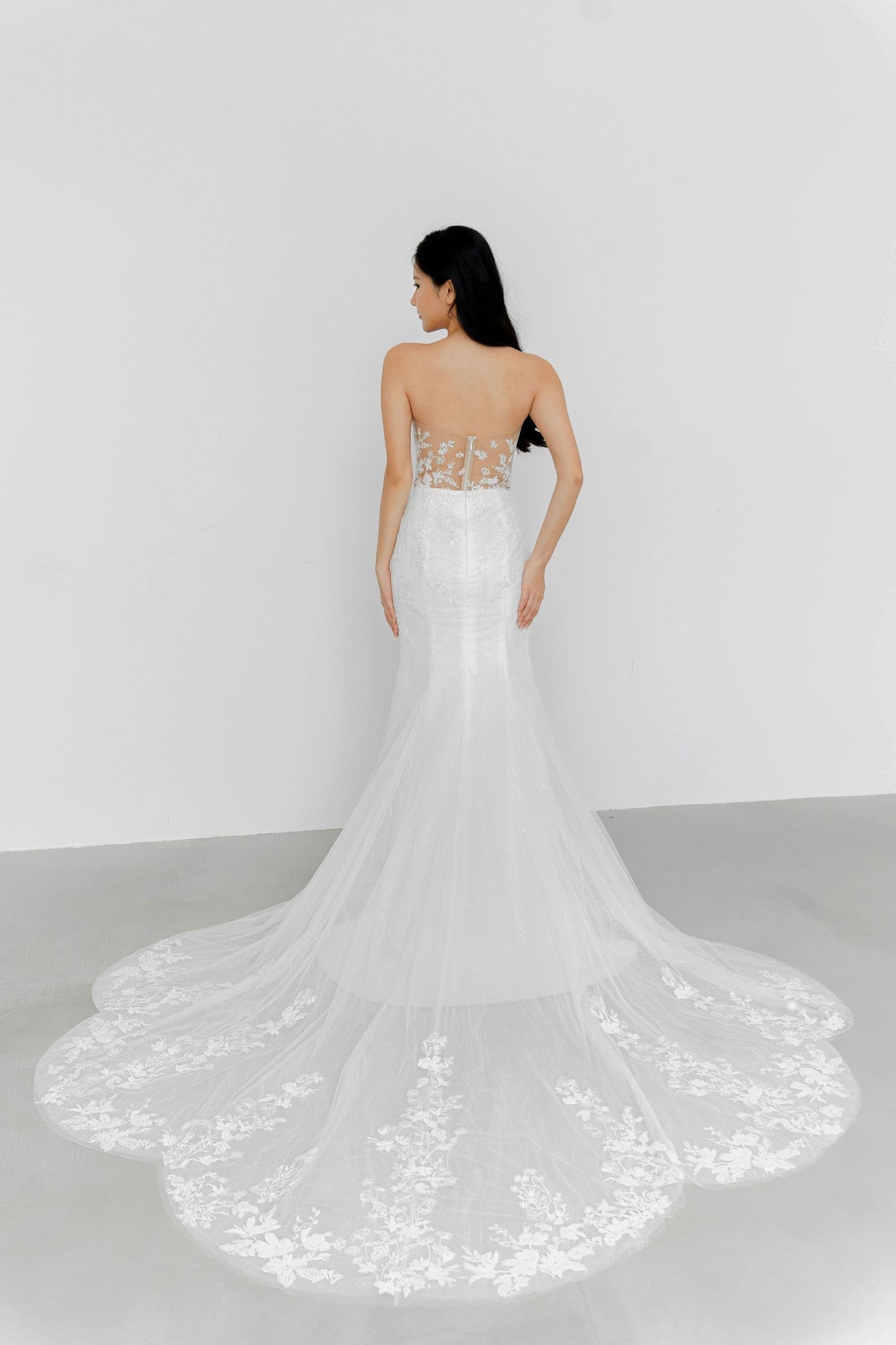 Alethea bridal gown train showcasing the unique petal-shaped lace design