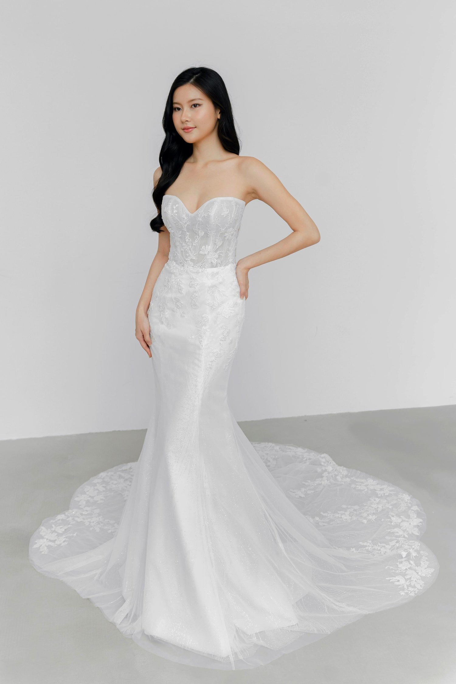 Alethea wedding dress featuring shimmering glitter fabric and beaded lace detailing