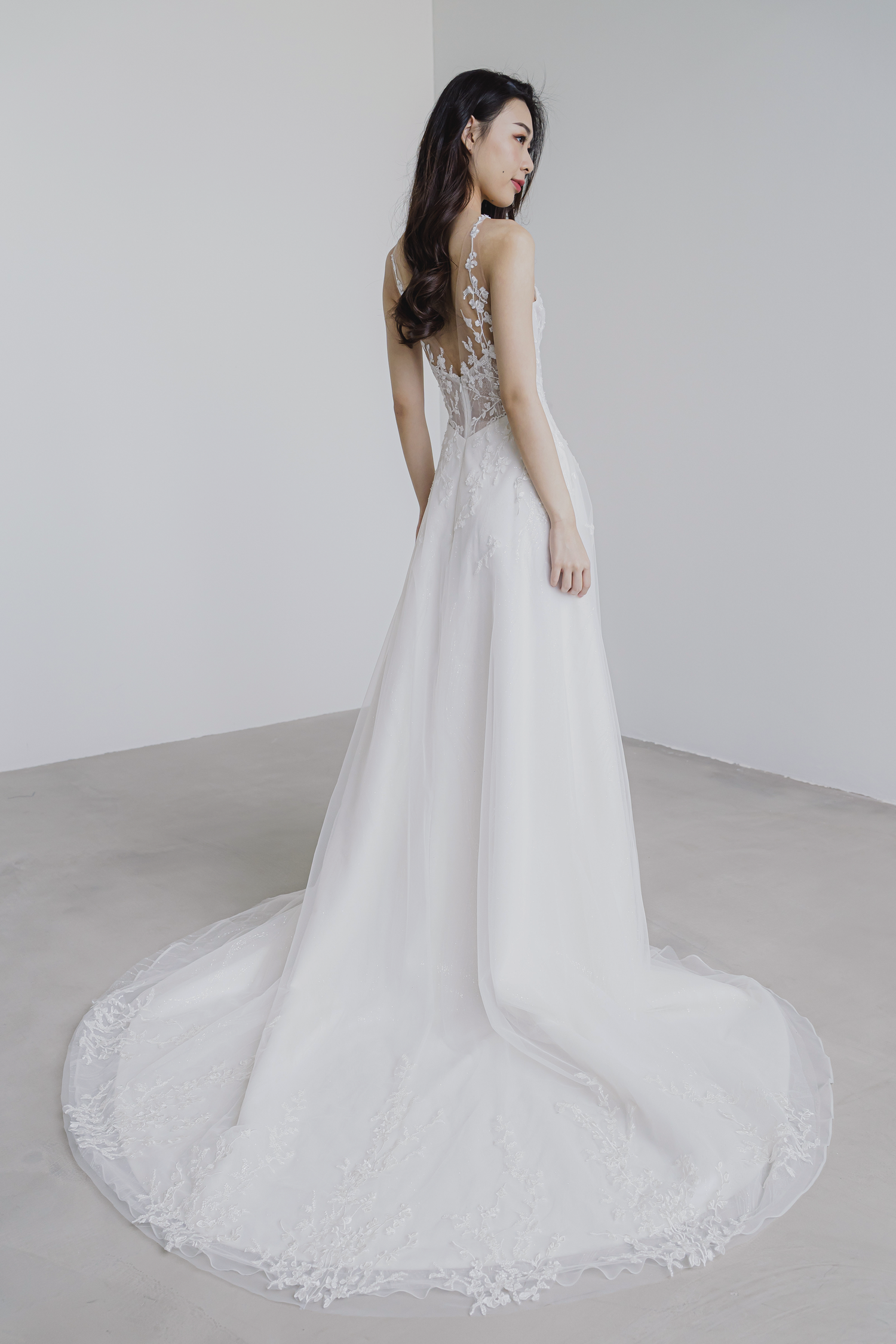 Alivia bridal gown side view with a flowing A-line skirt
